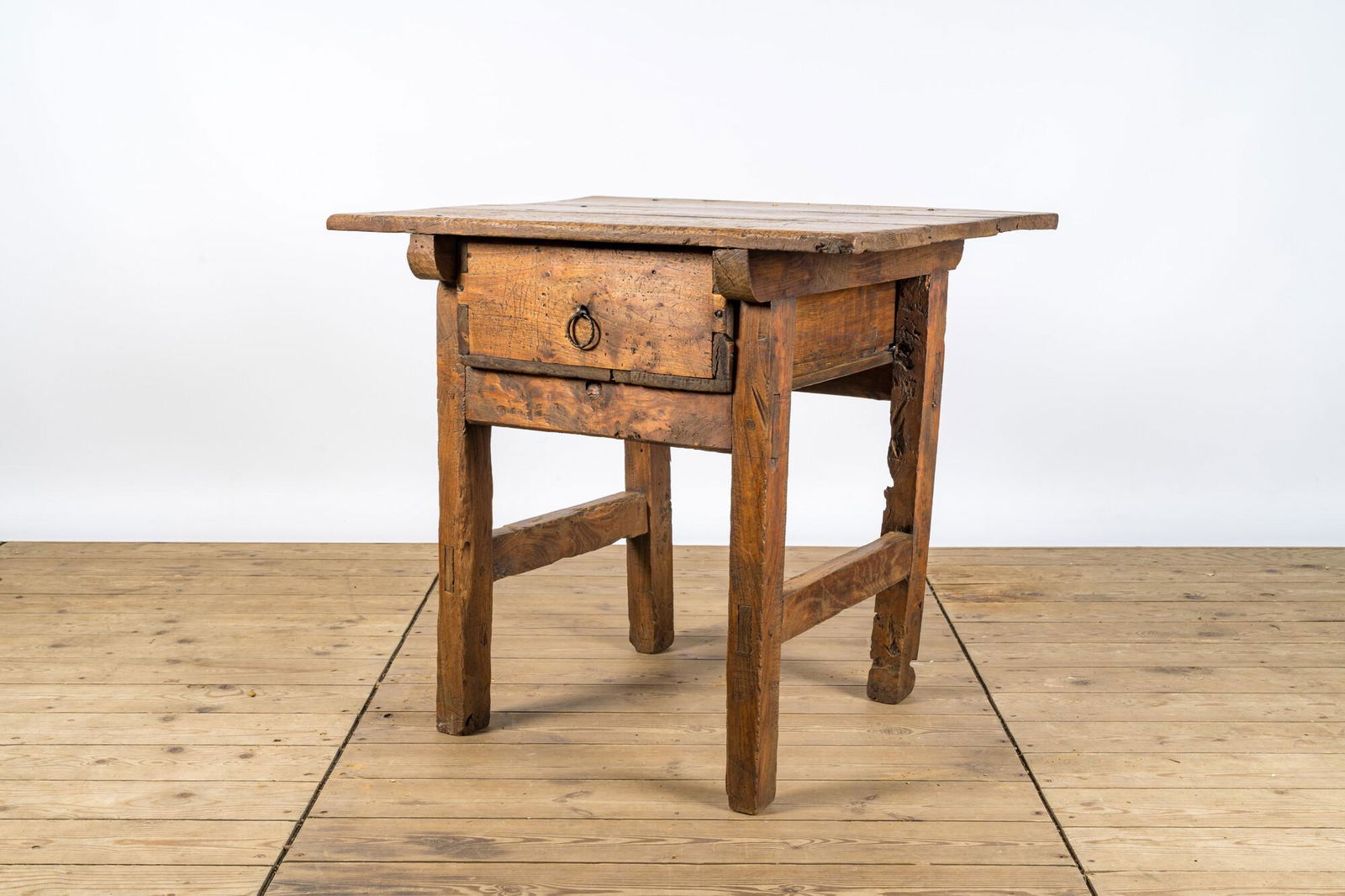 A rustic rural wooden table with drawer, 19th C. (1 of 3)