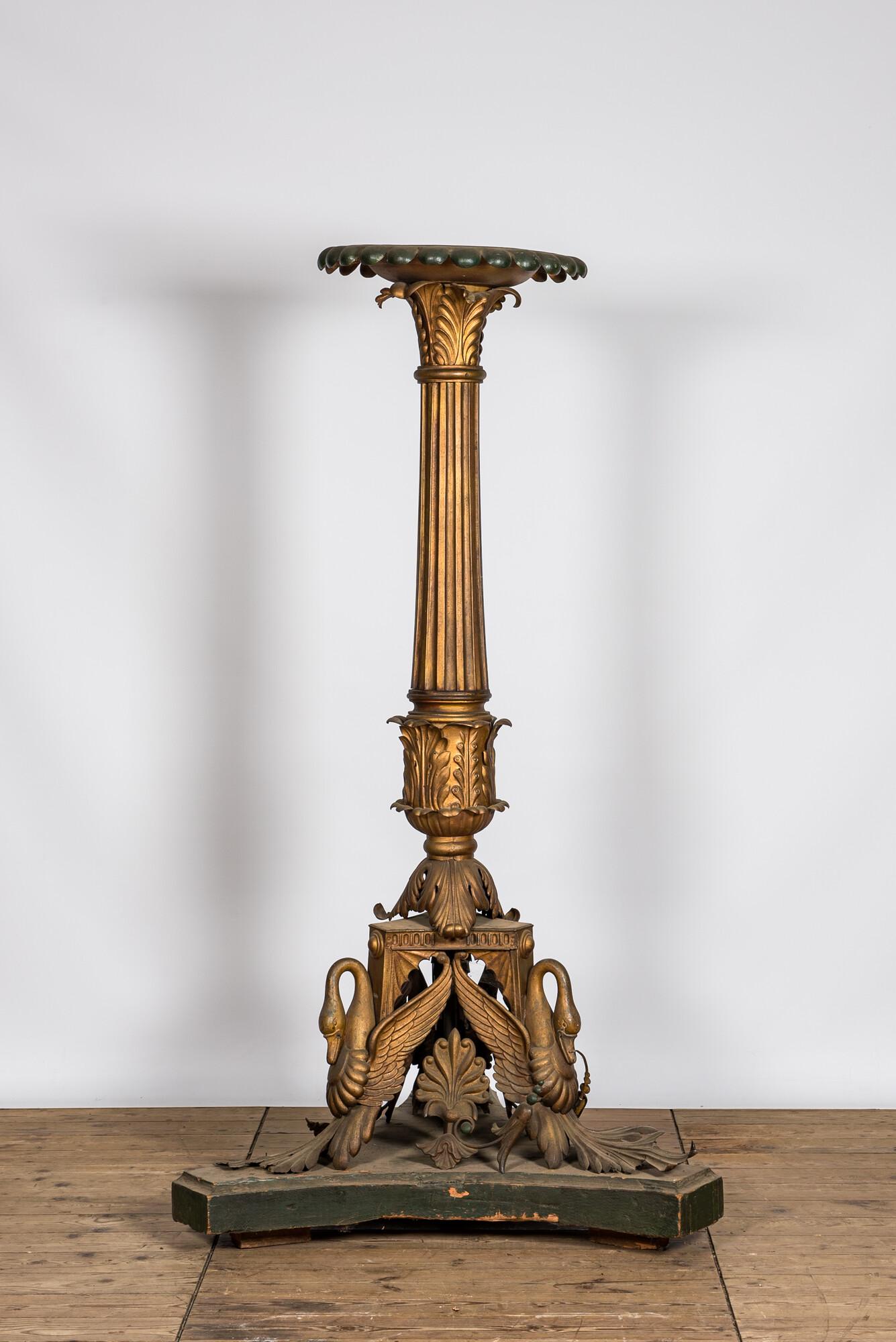 An imposing polychrome and gilt metal candlestick on a wooden base, 20th C.: Full title: An imposing polychrome and gilt metal candlestick on a wooden base, 20th C. Description: H 201 cm About this sale: Paul De Grande is one of the major dealers of antique furniture, fine scu