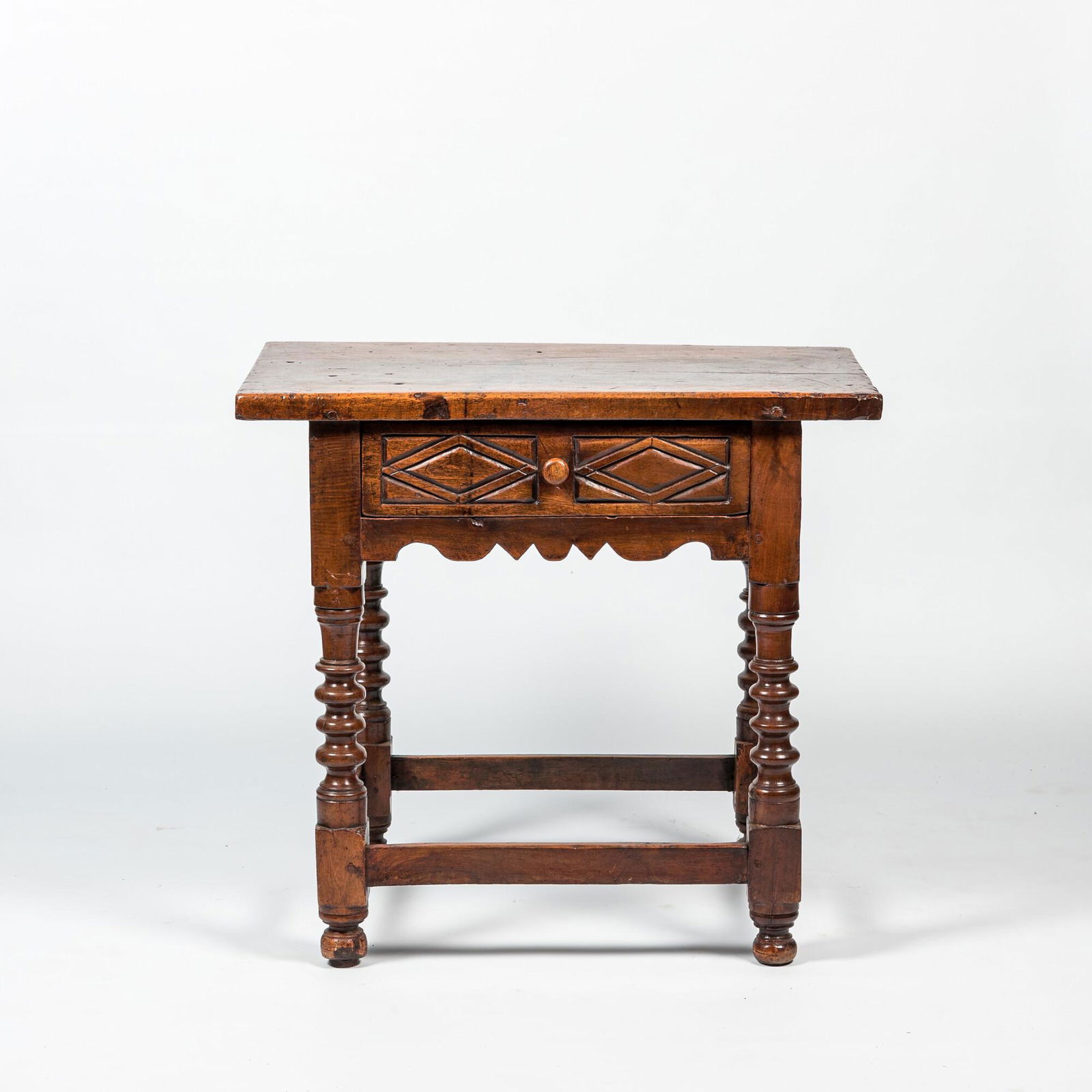 A Spanish walnut side table, 17/18th C. (1 of 2)