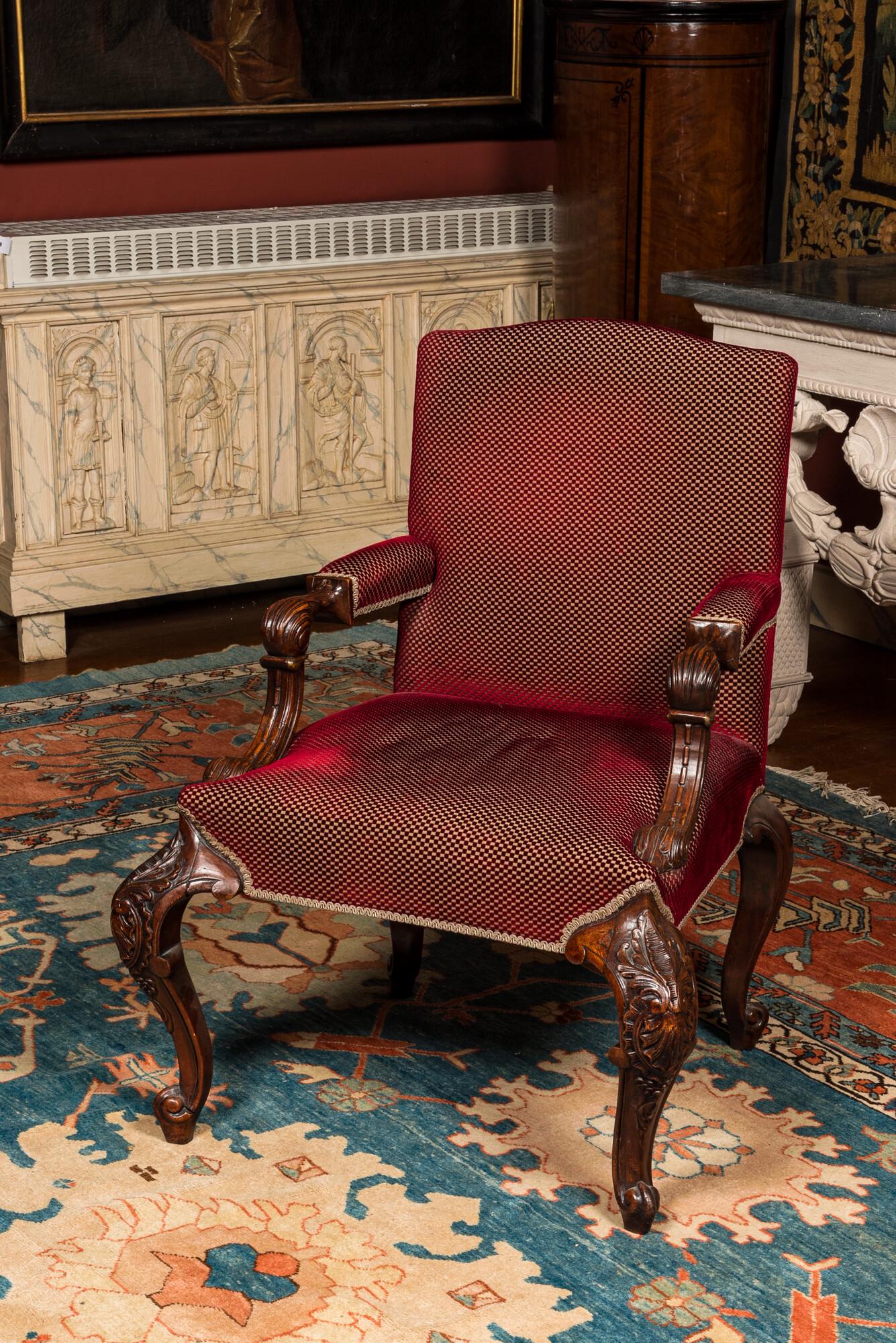 A Spanish or Portuguese walnut armchair, 19th C.: Full title: A Spanish or Portuguese walnut armchair, 19th C. Description: H 101 x L 77,5 x D 78 cm About this sale: Paul De Grande is one of the major dealers of antique furniture, fine sculptures and
