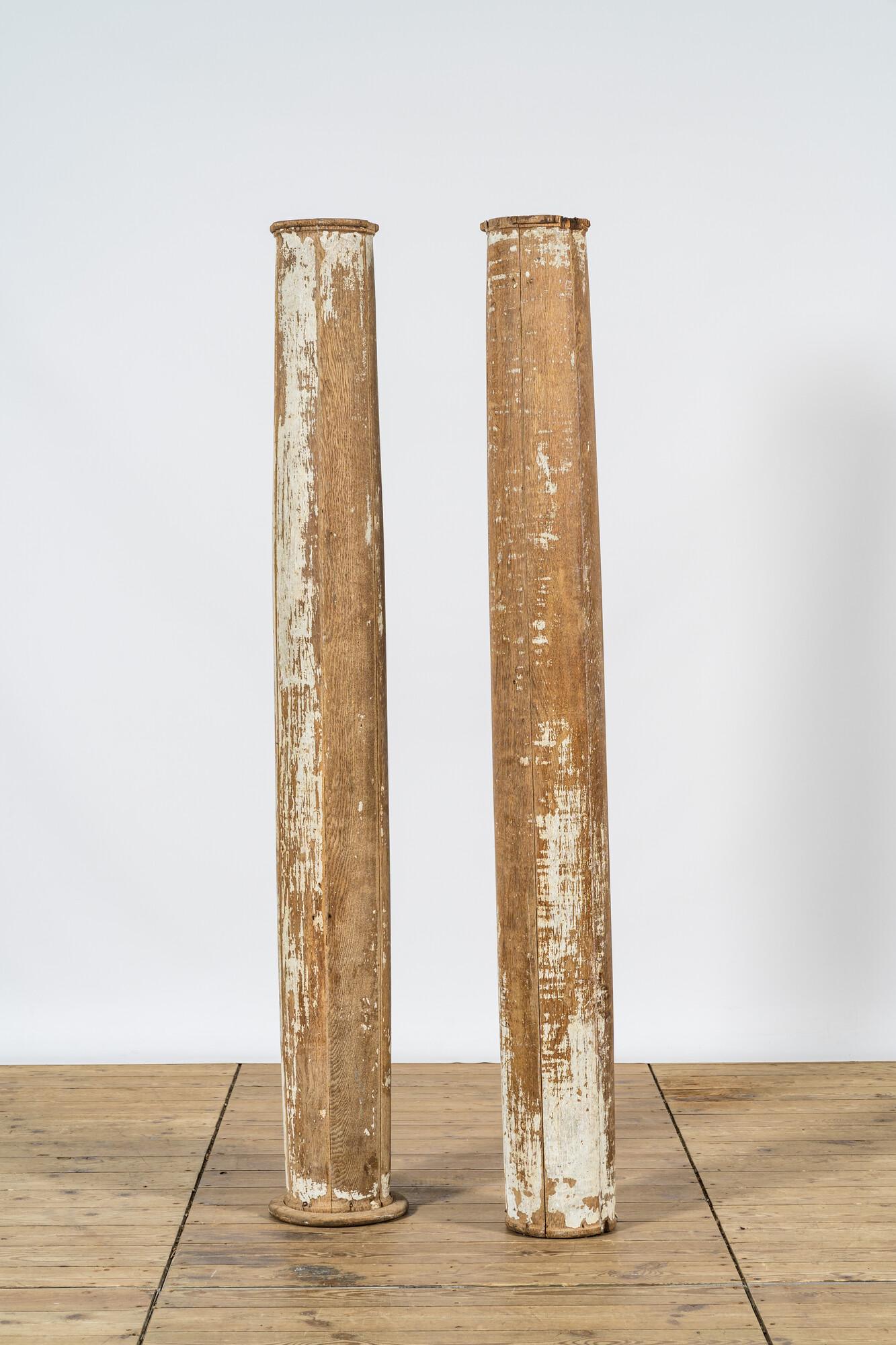 A pair of partly patinated wooden columns, 19th C. (1 of 2)