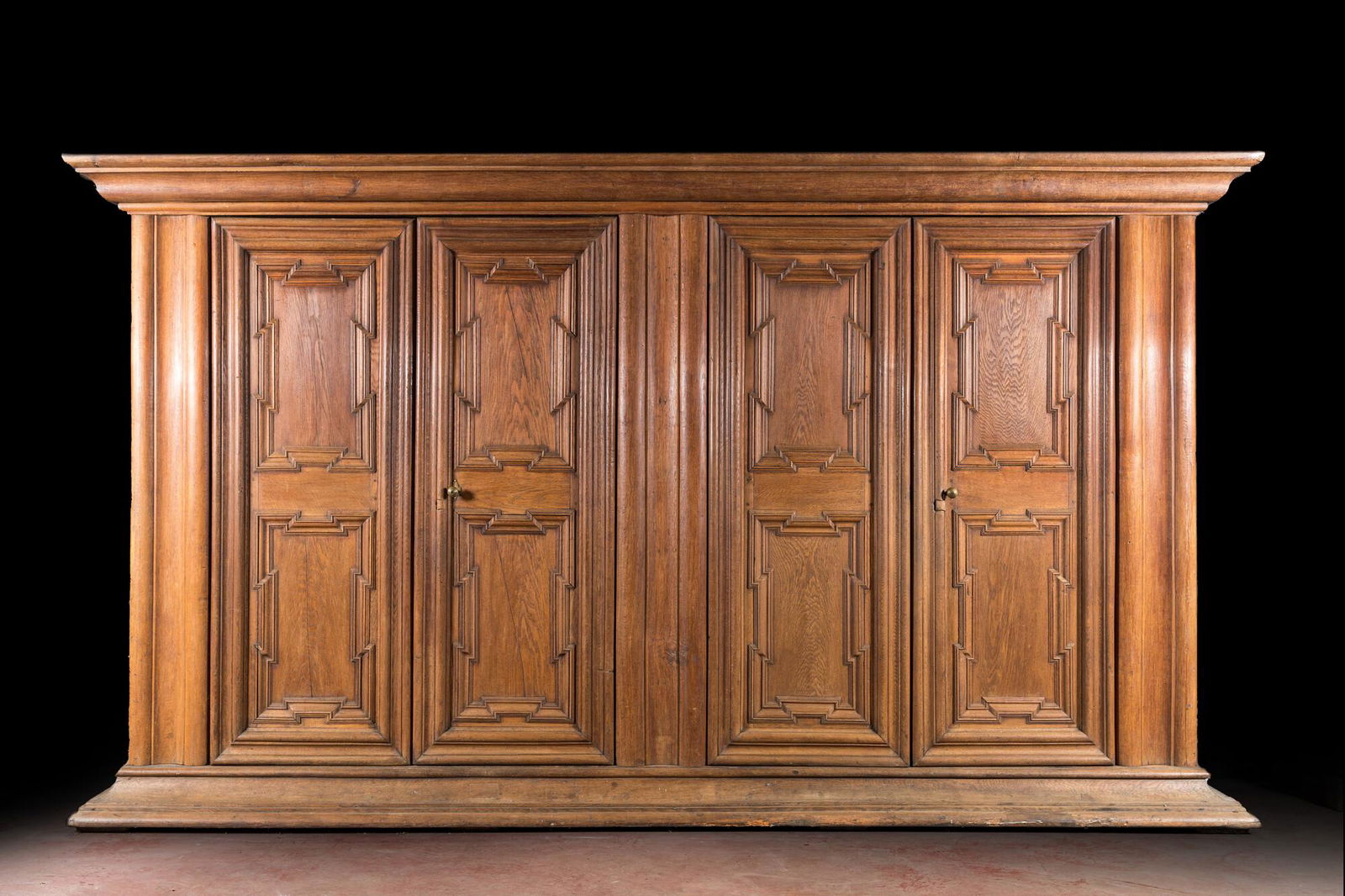 A large German oak wooden four-door wardrobe, 18th C. (1 of 2)