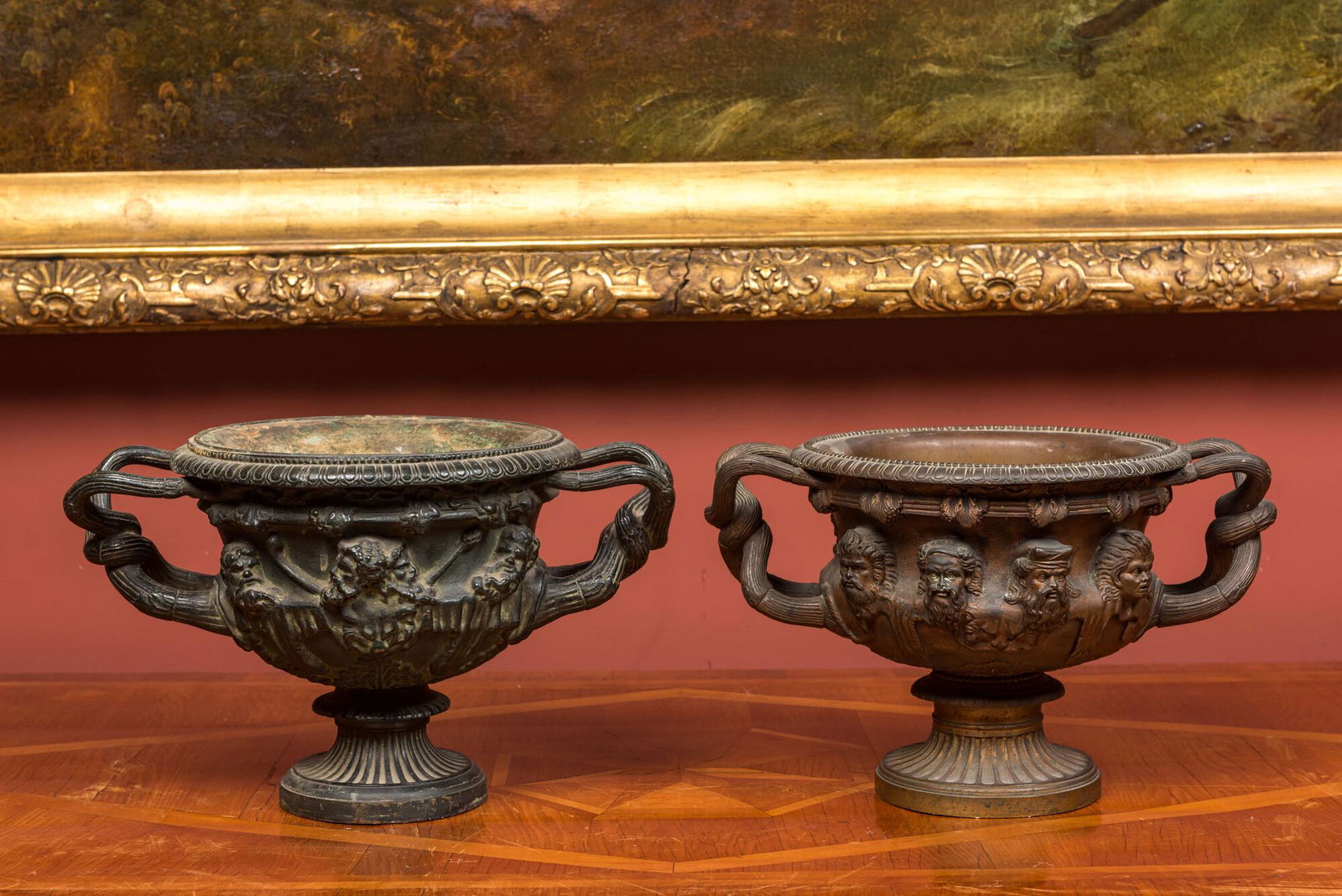Two bronze jardinieres with molded design of men's heads, 19th C. (1 of 2)