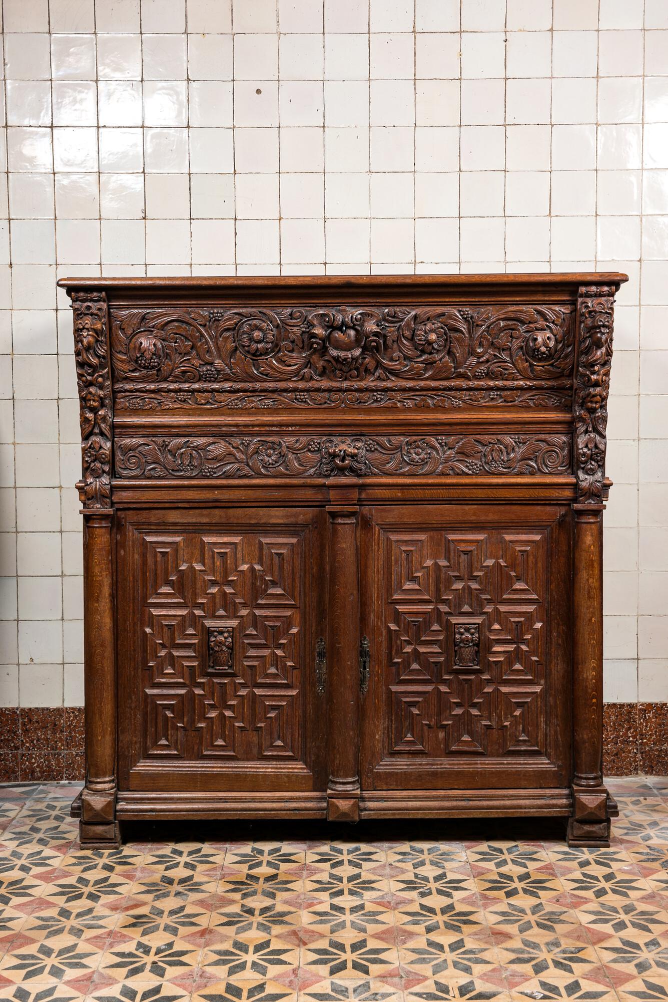 A Flemish oak 'columns' cupboard, 17th C. with later elements (1 of 5)