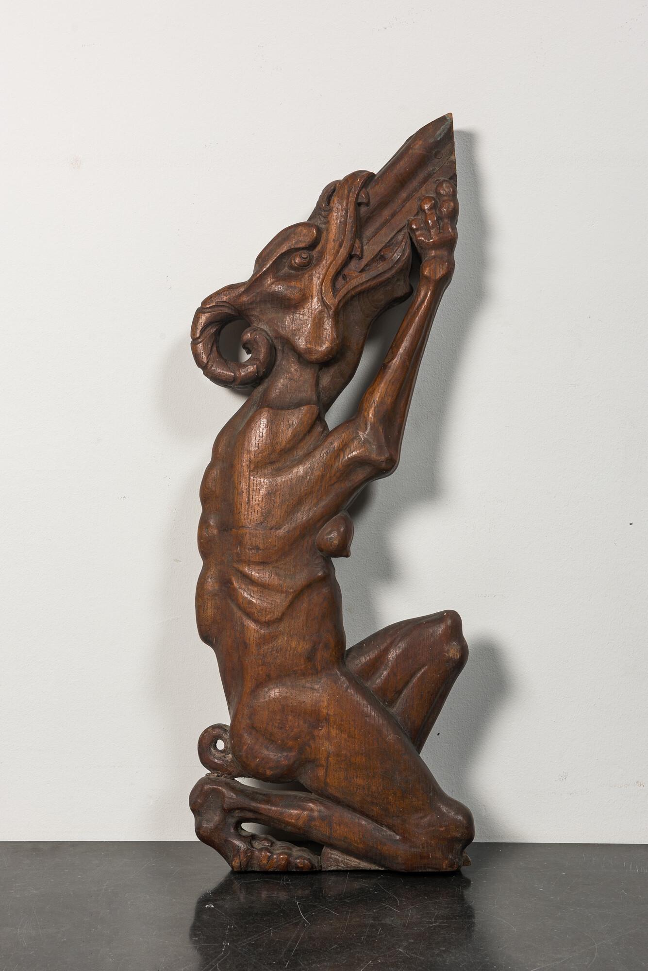A carved wooden balustrade fragment in the shape of a female dragon, 19th C.: Full title: A carved wooden balustrade fragment in the shape of a female dragon, 19th C. Description: H 77,5 x L 30 cm About this sale: Paul De Grande is one of the major dealers of antique furniture,