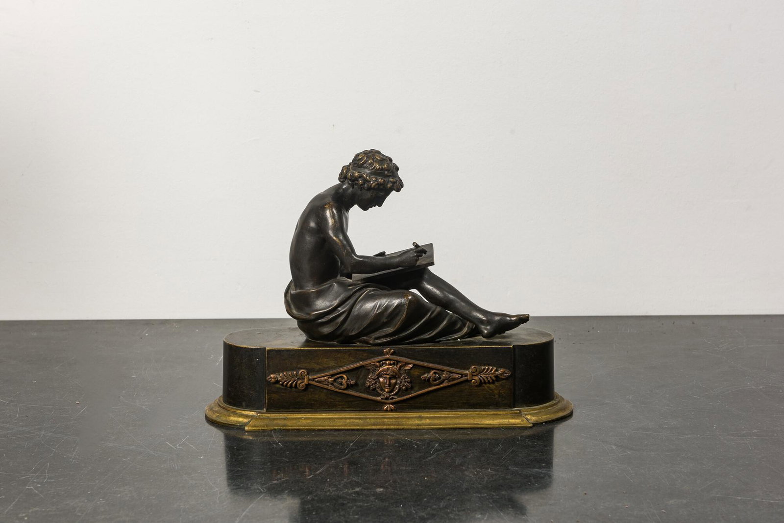 A bronze sculpture of a philosopher after the antique, 19th C.: Full title: A bronze sculpture of a philosopher after the antique, 19th C. Description: H 28 - L 38 cm About this sale: Paul De Grande is one of the major dealers of antique furniture, fine sculptures