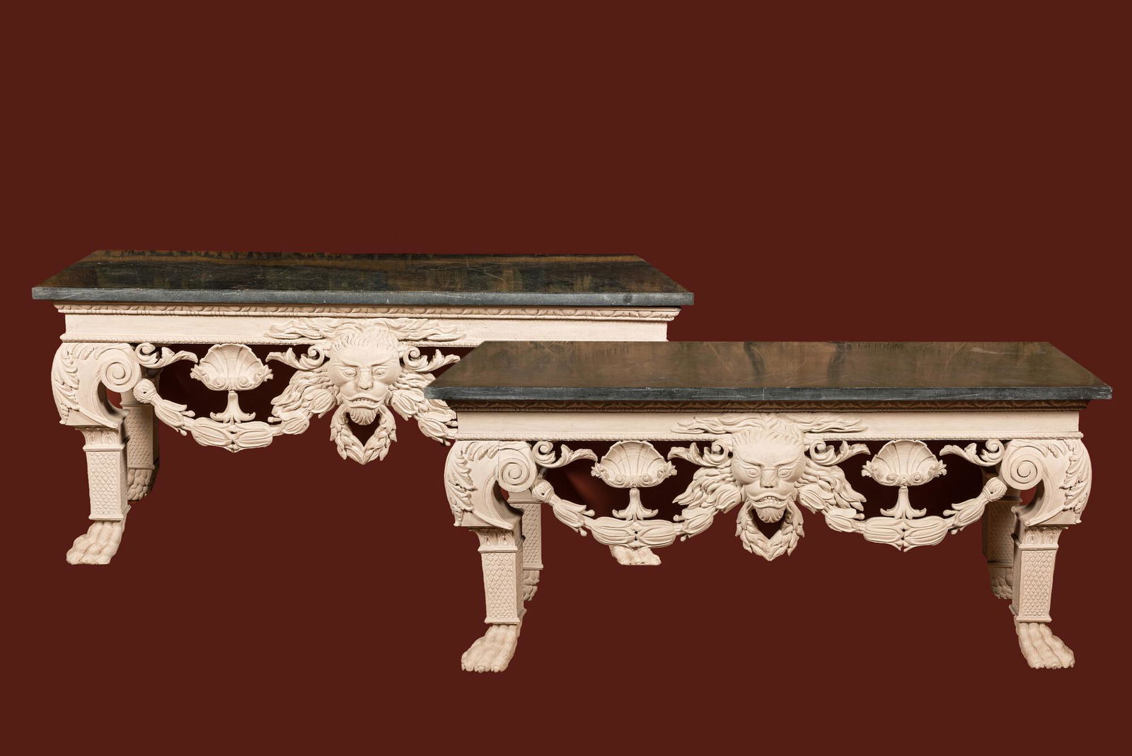 A pair of imposing white patinated consoles with a central mascaron and bluestone top, 19/20th C. (1 of 12)