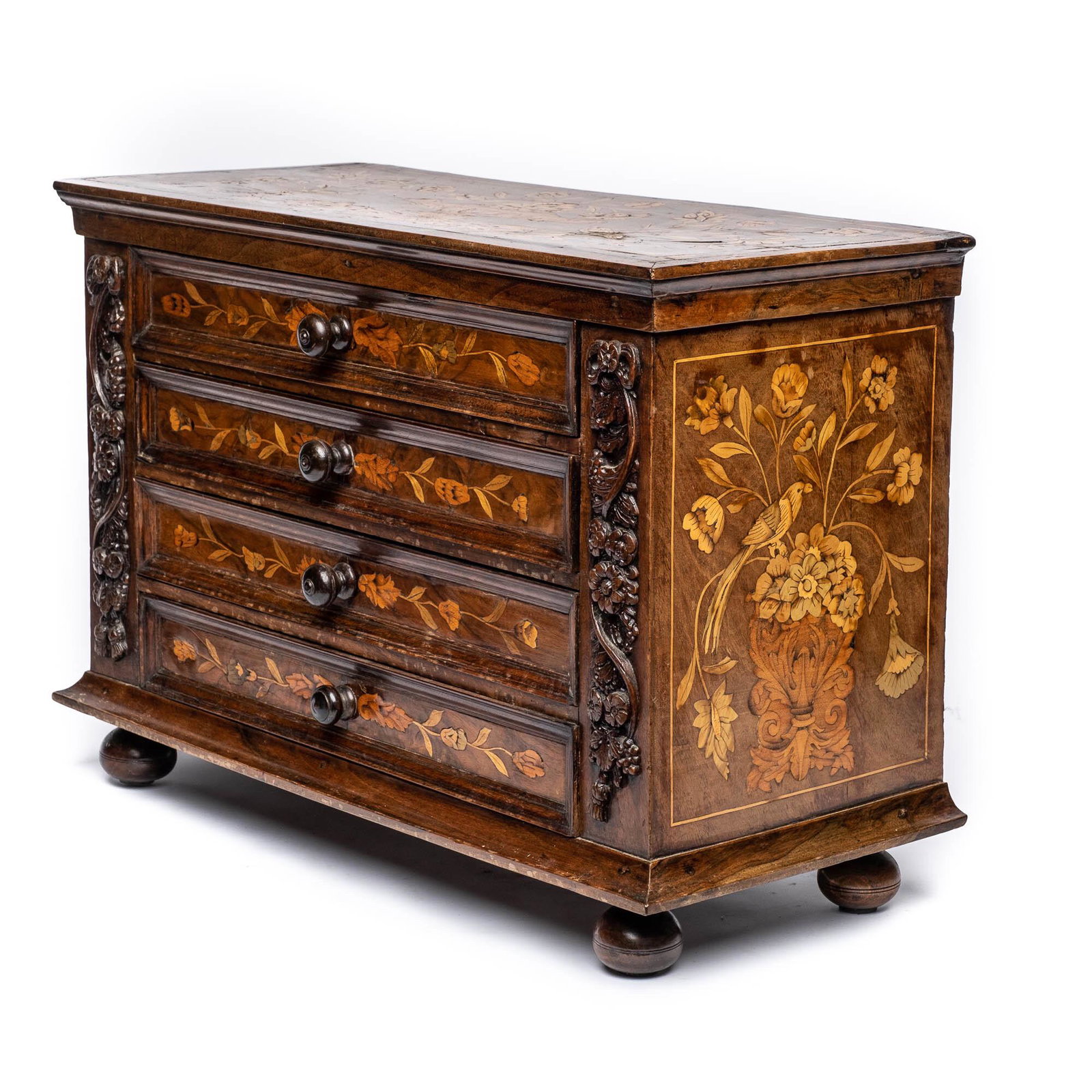 A four-drawer table cabinet with floral marquetry, probably The Netherlands, 18/19th C. (1 of 8)