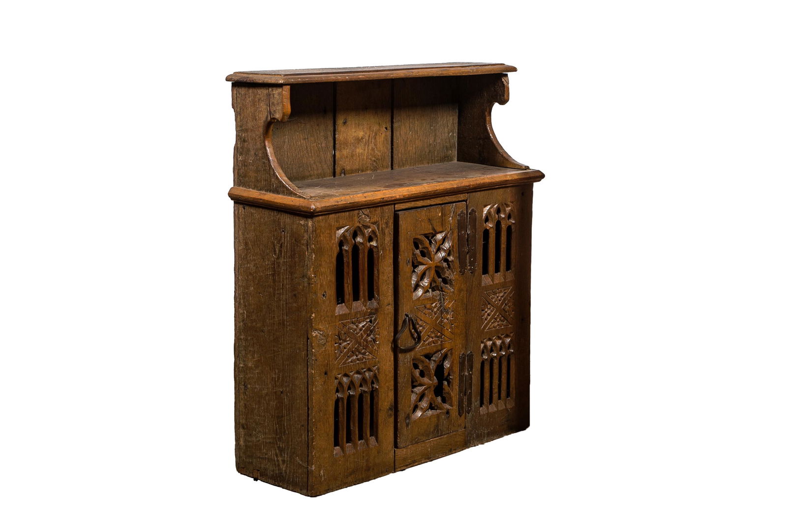 An English Gothic carved oak hanging cupboard composed of old elements, 17th C. and later (1 of 2)