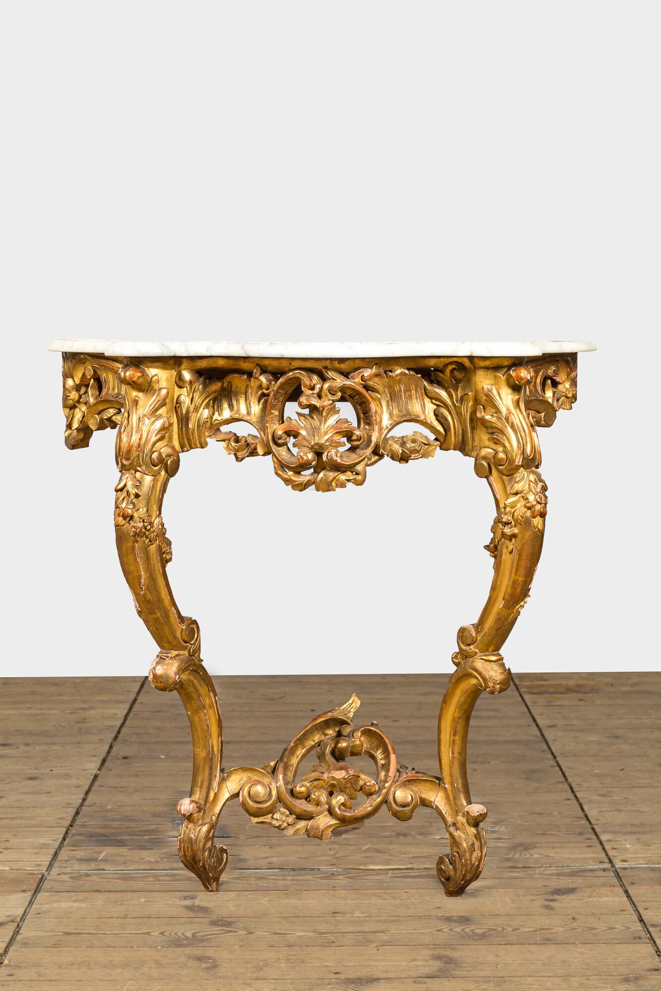 A gilt wooden console, 18/19th C. (1 of 2)