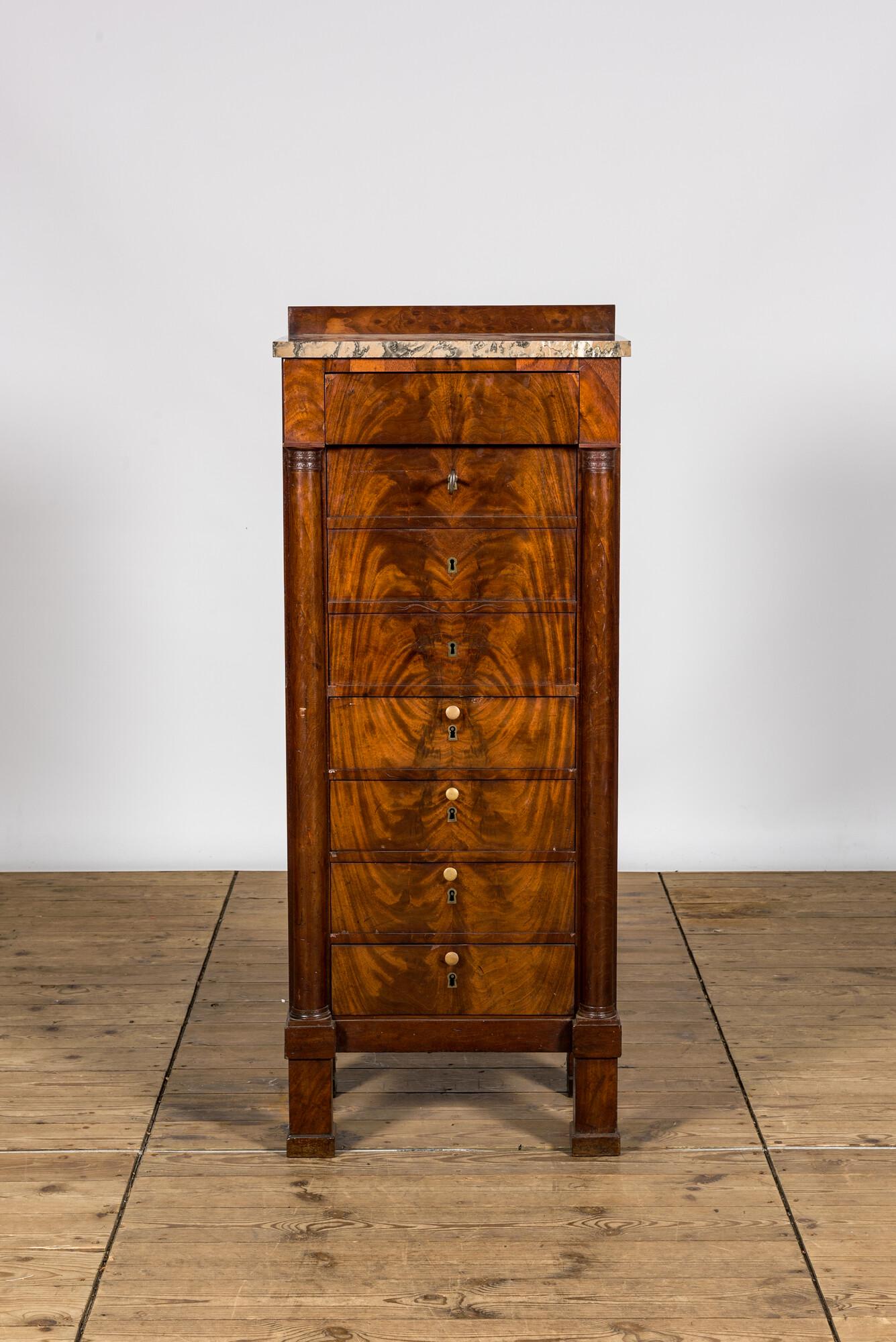 A mahogany 'semainier' with marble top, 19th C. (1 of 3)