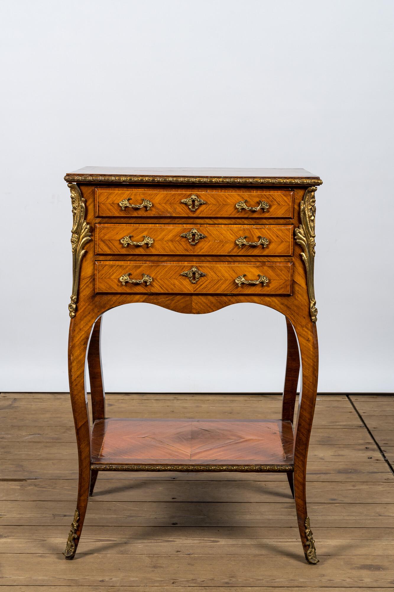 A French gilt bronze mounted three drawer side table, 19/20th C. (1 of 3)