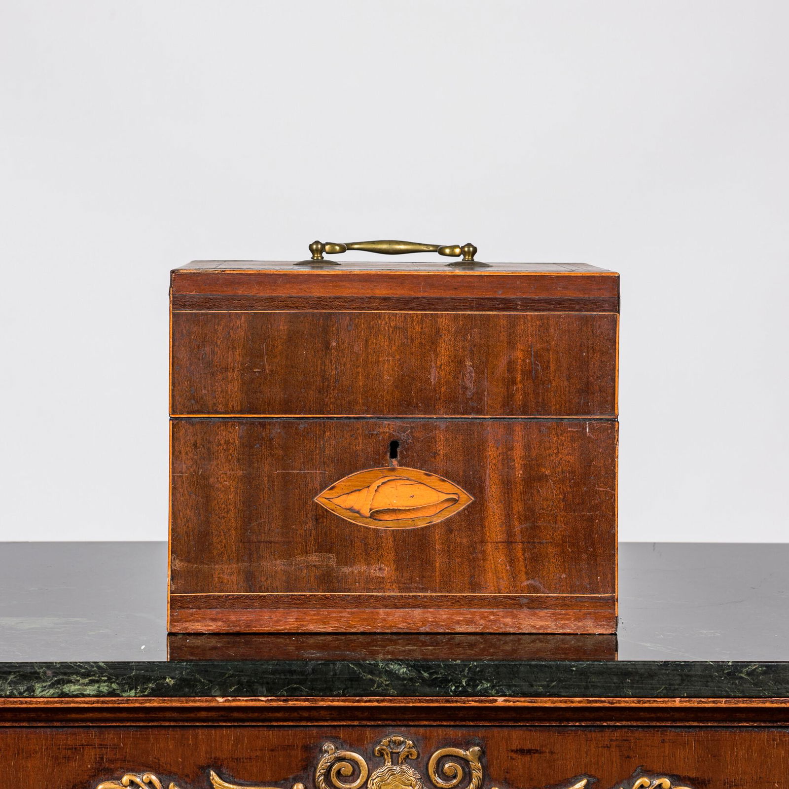 An English mahogany liqueur cellar with six partly gilt carafes, 19th C. (1 of 5)