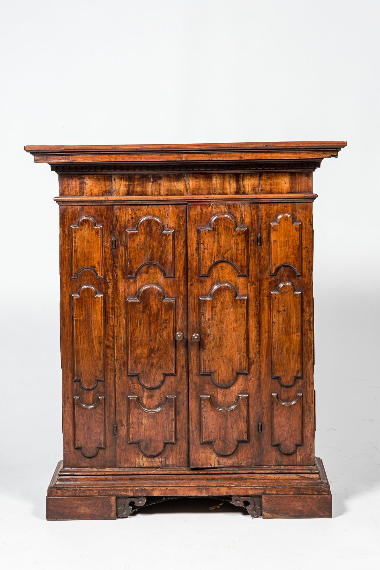 A two-door walnut cabinet, 18th C. and later (1 of 3)