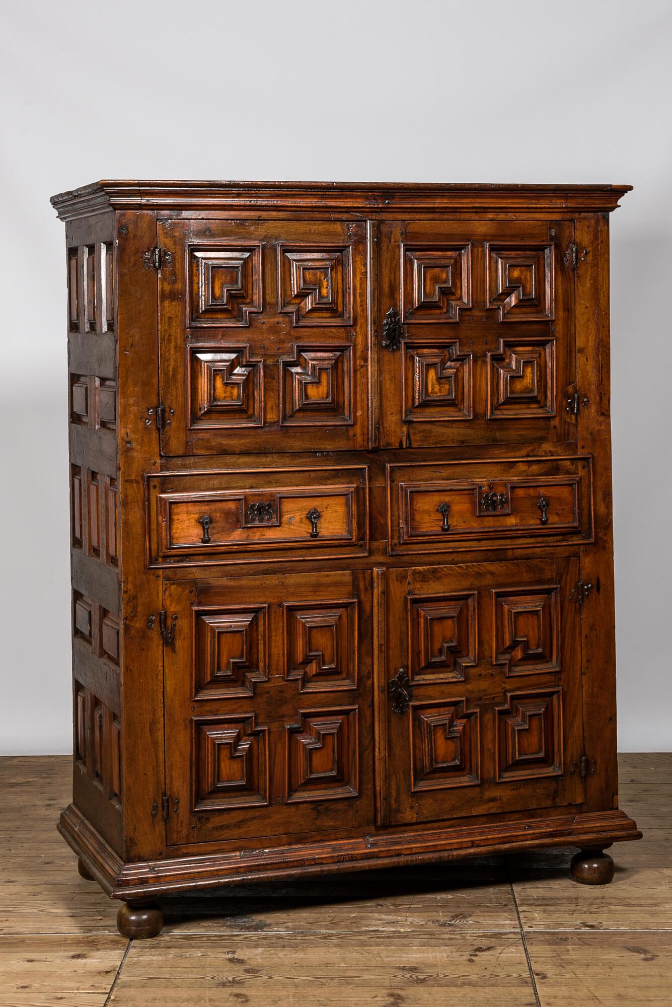 An English Jacobean-style four-door cabinet, 19th C. (1 of 3)