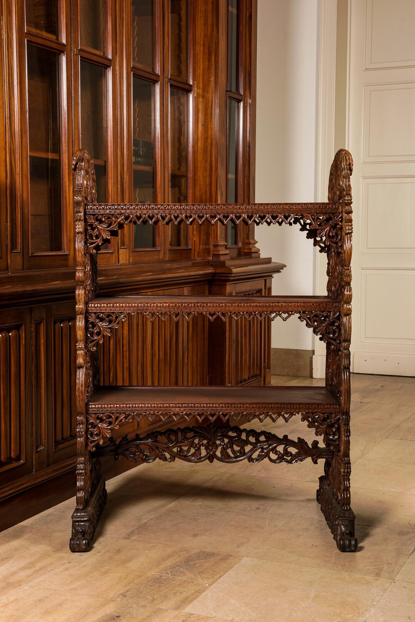 A richly carved oak etagère with floral design, probably Italy, 19th C. (1 of 5)