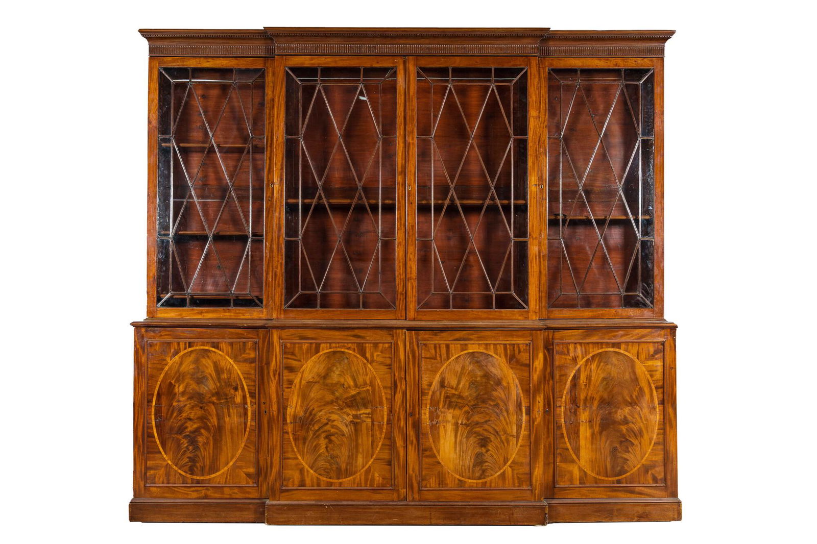 A large English magohany four-door break fronted library bookcase, 19th C. (1 of 3)