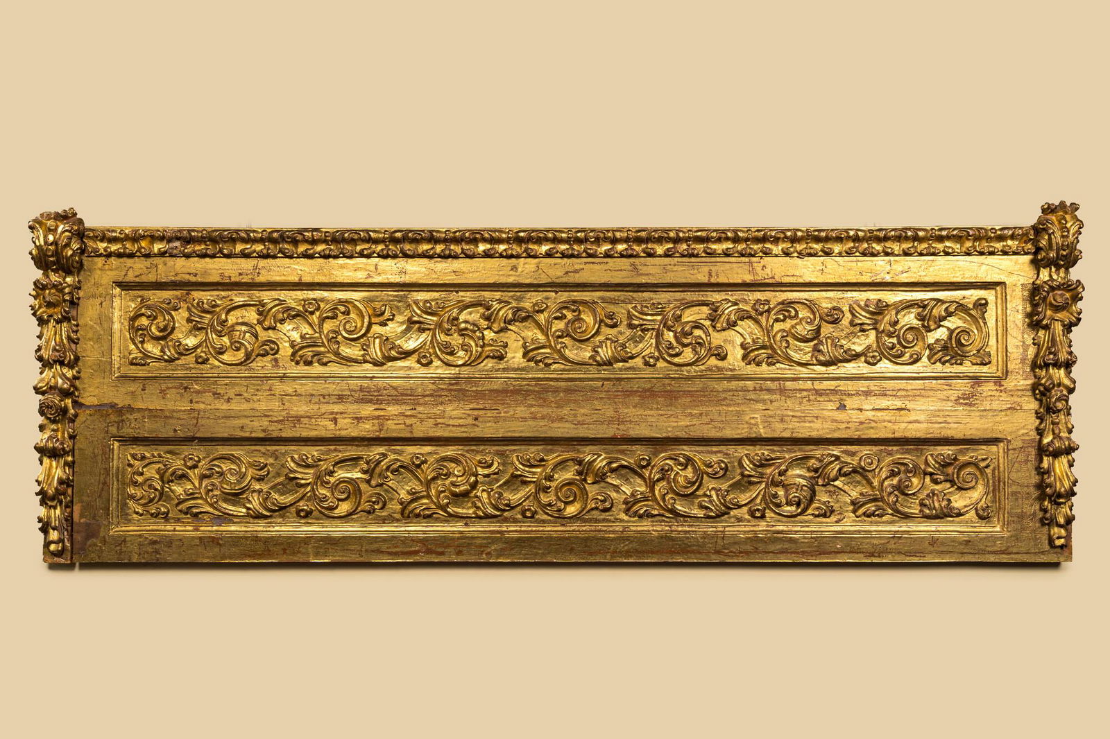 A large carved and gilt wooden panel with floral design, Italy, 17th C. (1 of 3)
