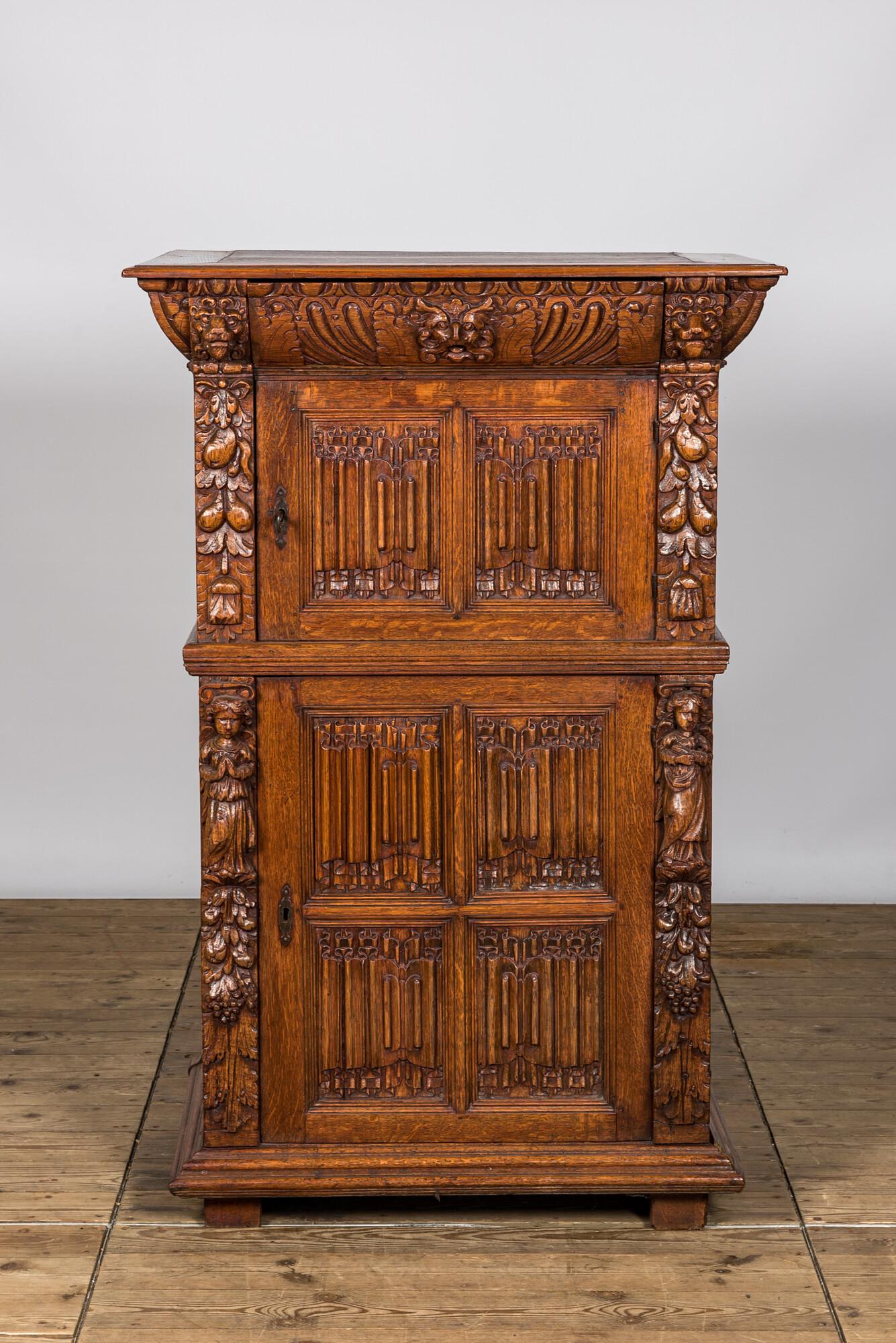 A Gothic Revival oak two-door cupboard with linenfold panels, 19th C. with older elements: Full title: A Gothic Revival oak two-door cupboard with linenfold panels, 19th C. with older elements Description: H 138,5 x L 90 x D 62,5 cm About this sale: Paul De Grande is one of the major dealer