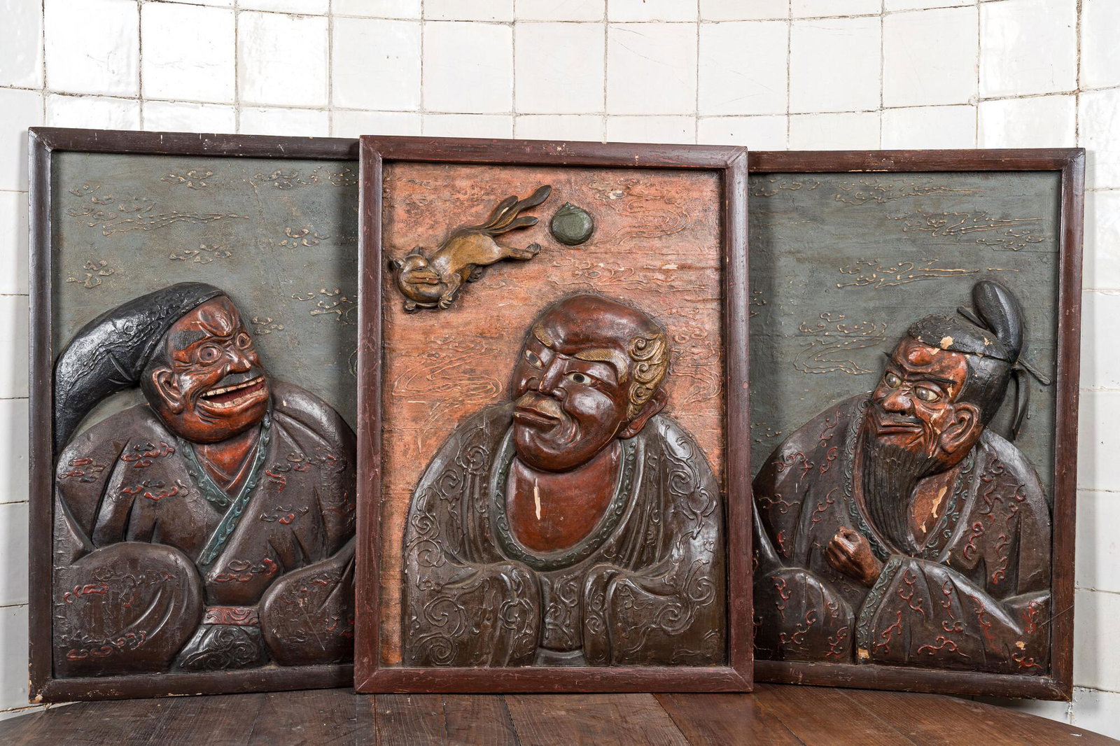 Three Japanese lacquered carved wooden panels, Meiji, 19th C. (1 of 5)