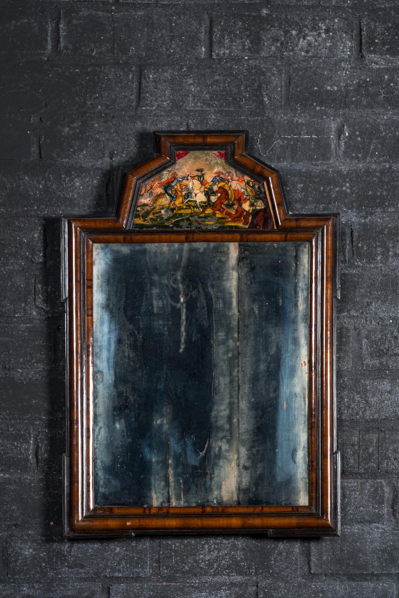 A Dutch mahogany mirror with ebonised frames and a reverse glass painting, 19th C.: Full title: A Dutch mahogany mirror with ebonised frames and a reverse glass painting, 19th C. Description: 80 x 55 cm About this sale: Paul De Grande is one of the major dealers of antique furniture,