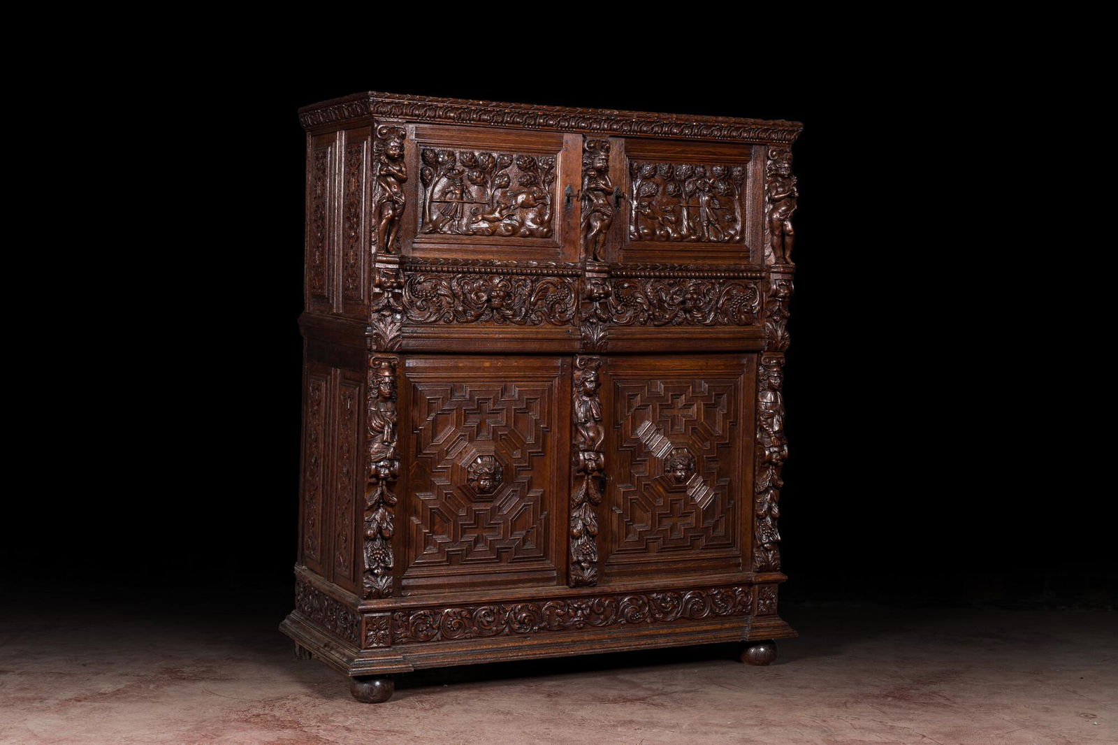 A Flemish richly carved oak 'beeldenkast' or cupboard, 17th C. (1 of 7)