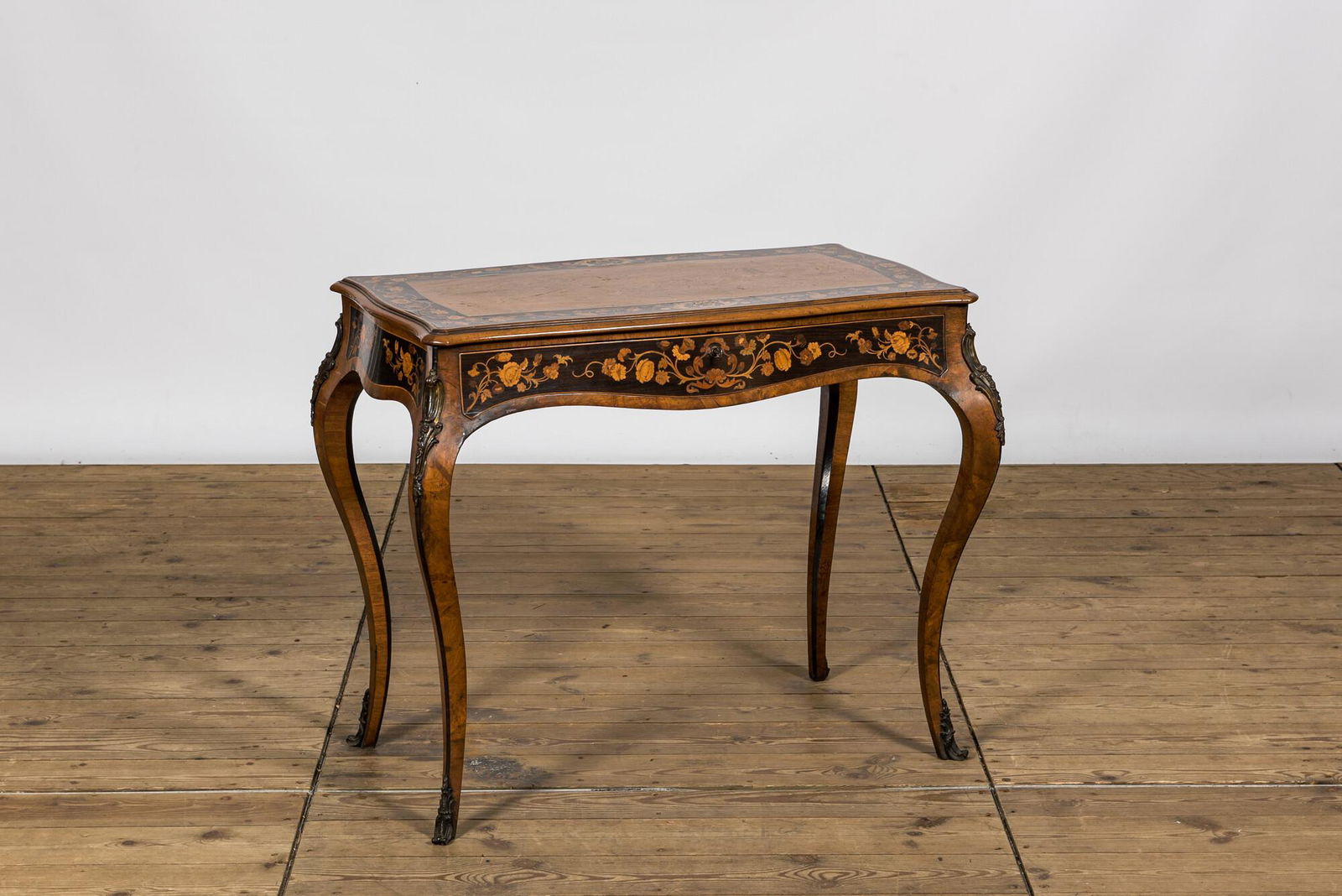 A French Louis XV-style bronze mounted floral marquetry side table, 19th C. (1 of 3)