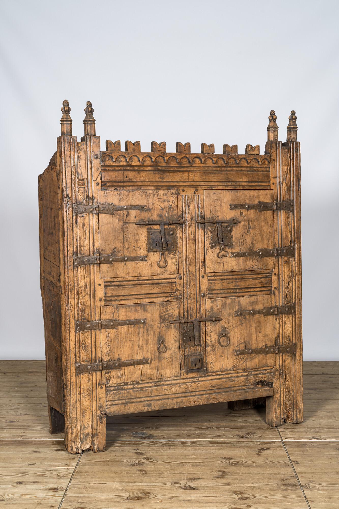 A Gothic wrought iron mounted wooden cabinet, Germany or France, 15/16th C. and later (1 of 3)