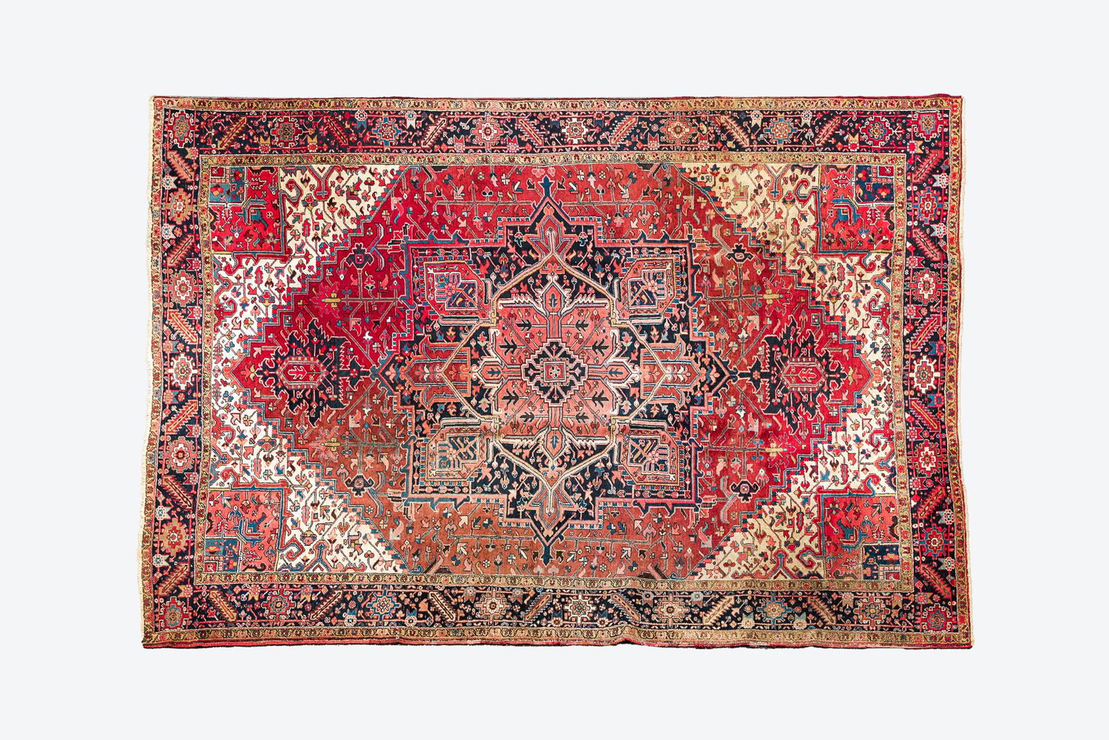 A large rectangular ornamental Heriz rug, 1st half 20th C. (1 of 3)