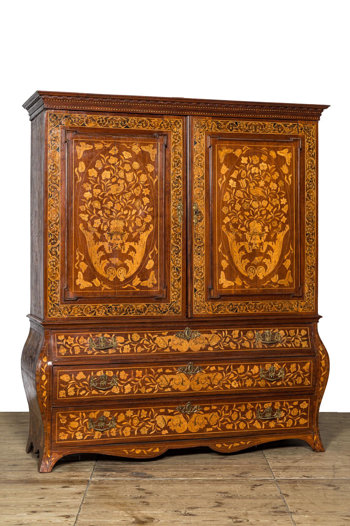 A Dutch mahogany floral marquetry cabinet with two doors and three drawers, 18/19th C. (1 of 3)