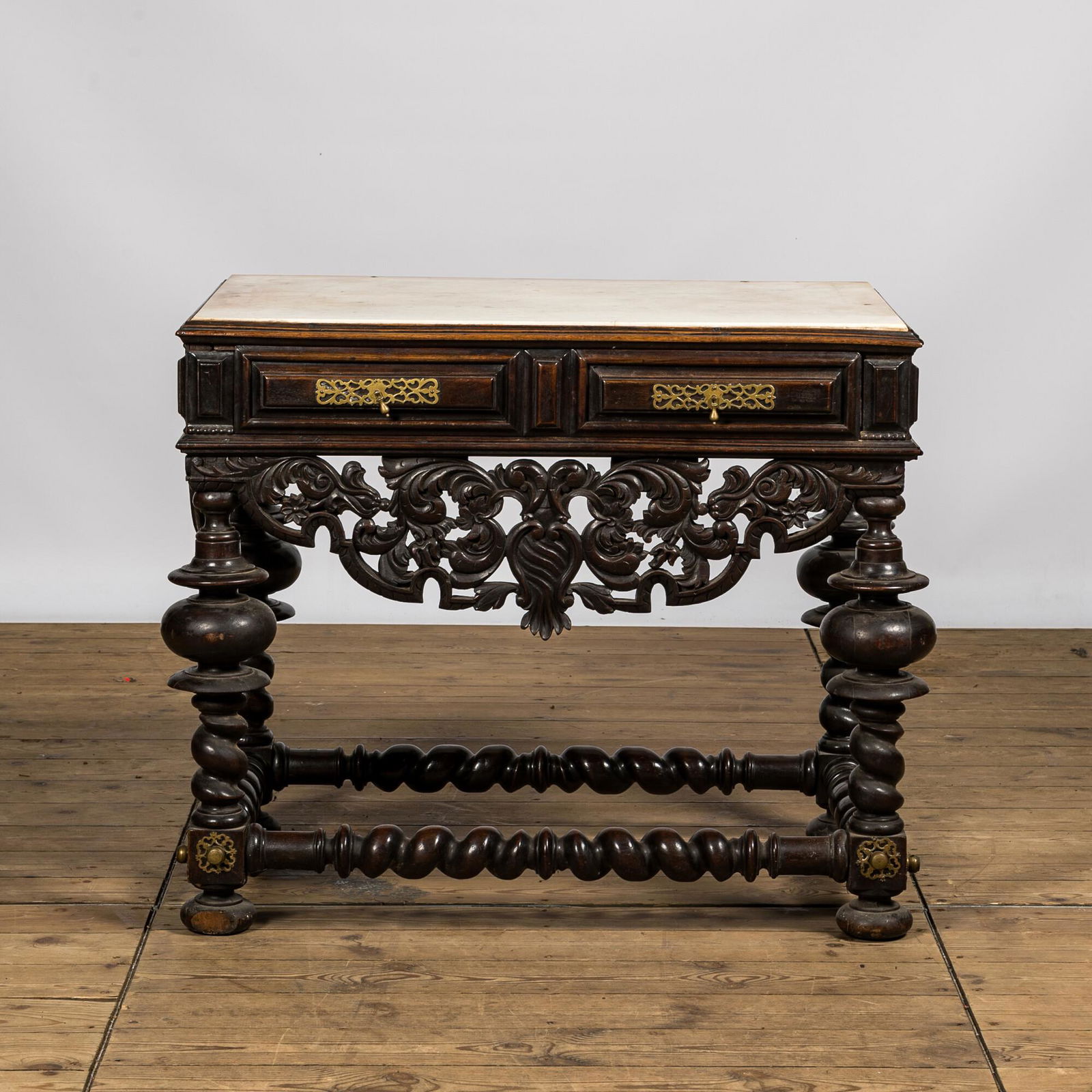 A Spanish brass mounted walnut console table with marble top, 19th C. (1 of 3)