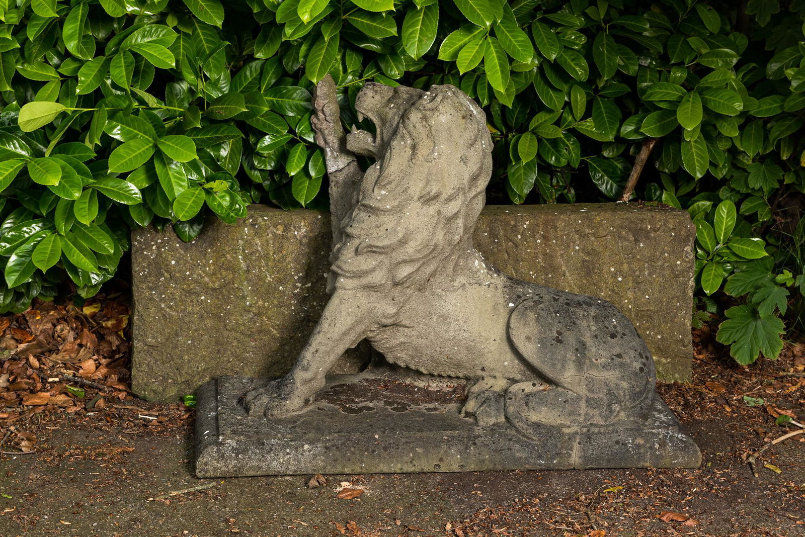A carved stone relief of a lion, 19th C. (1 of 2)
