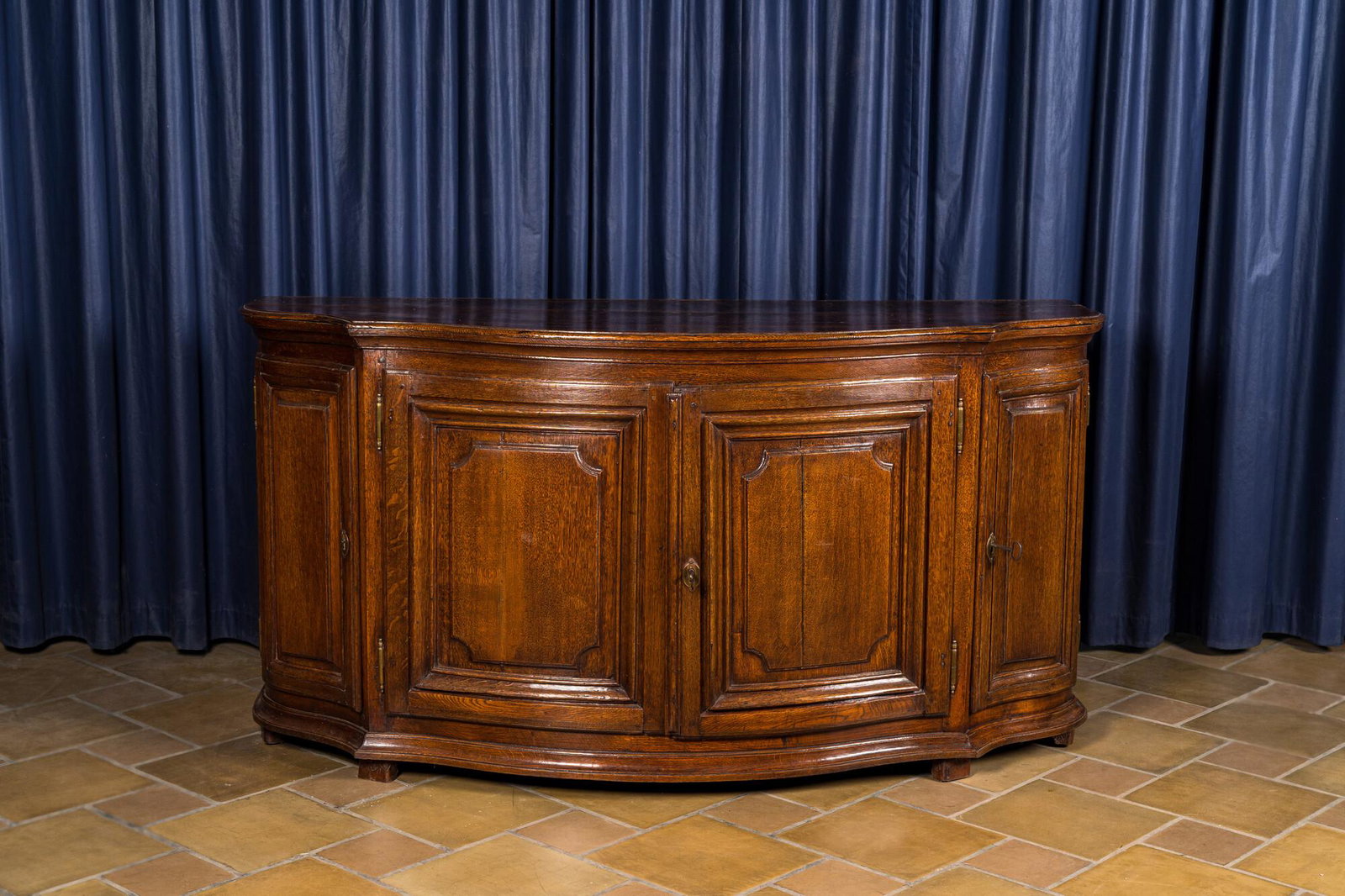 A French oak sideboard with curved front, 18th C.: Full title: A French oak sideboard with curved front, 18th C. Description: H 88,5 x L 173 x D 68,5 cm About this sale: Paul De Grande is one of the major dealers of antique furniture, fine sculptures 