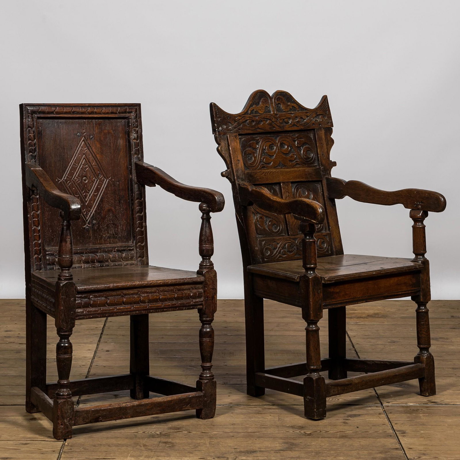Two carved oak armchairs, probably England, 17th C. or later (1 of 2)