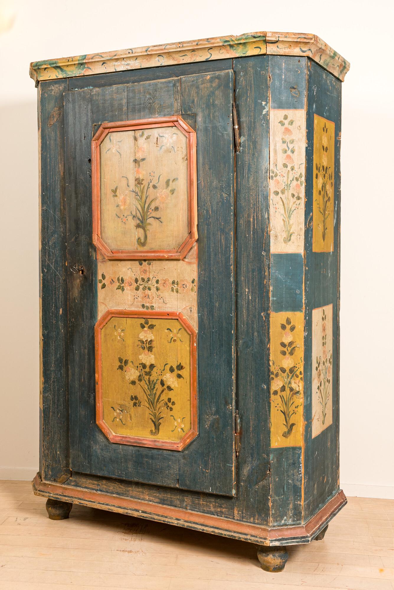 A German painted wooden one-door cupboard, 19th C. (1 of 2)