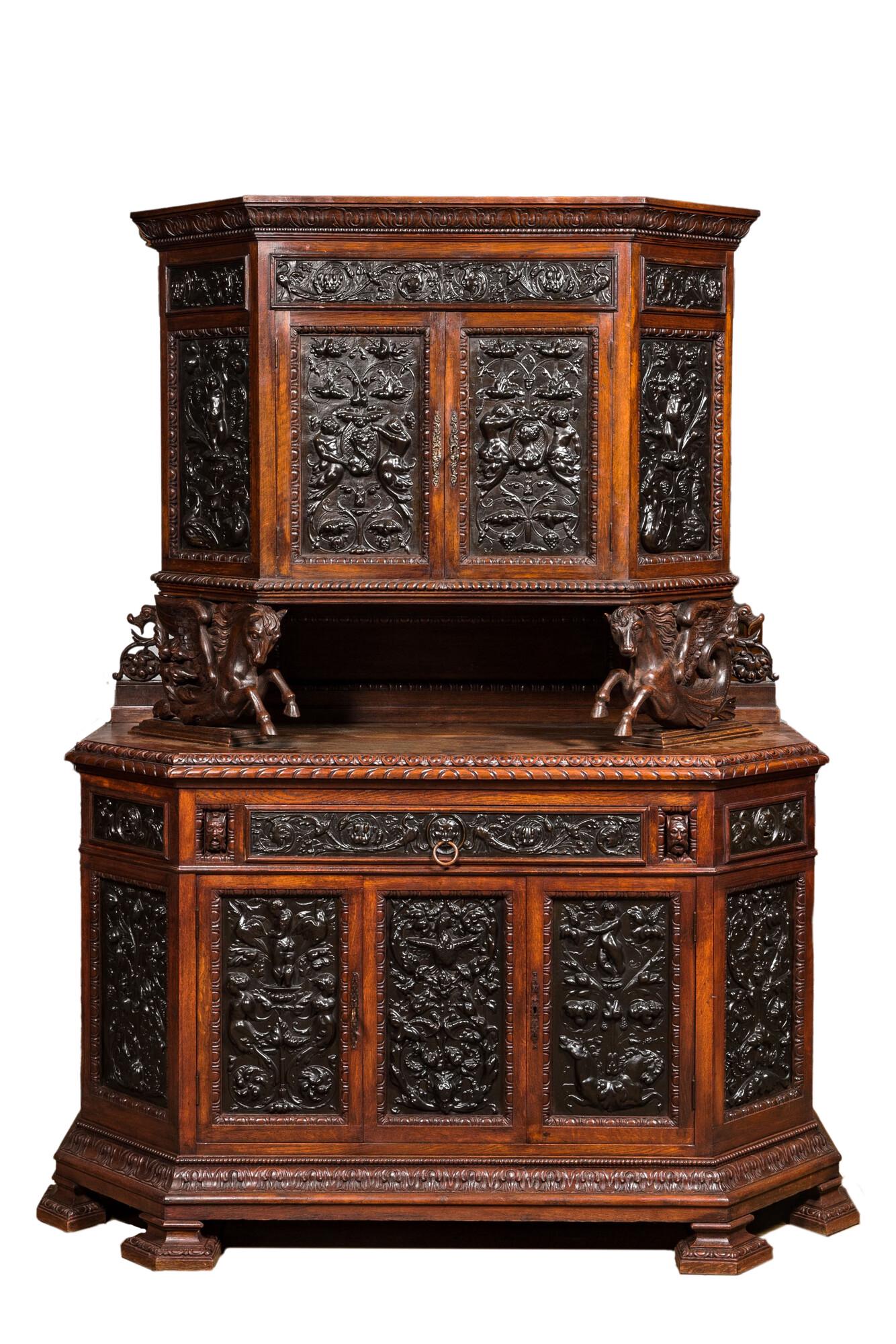 A carved oak buffet with stamped copper panels, 19/20th C. (1 of 5)