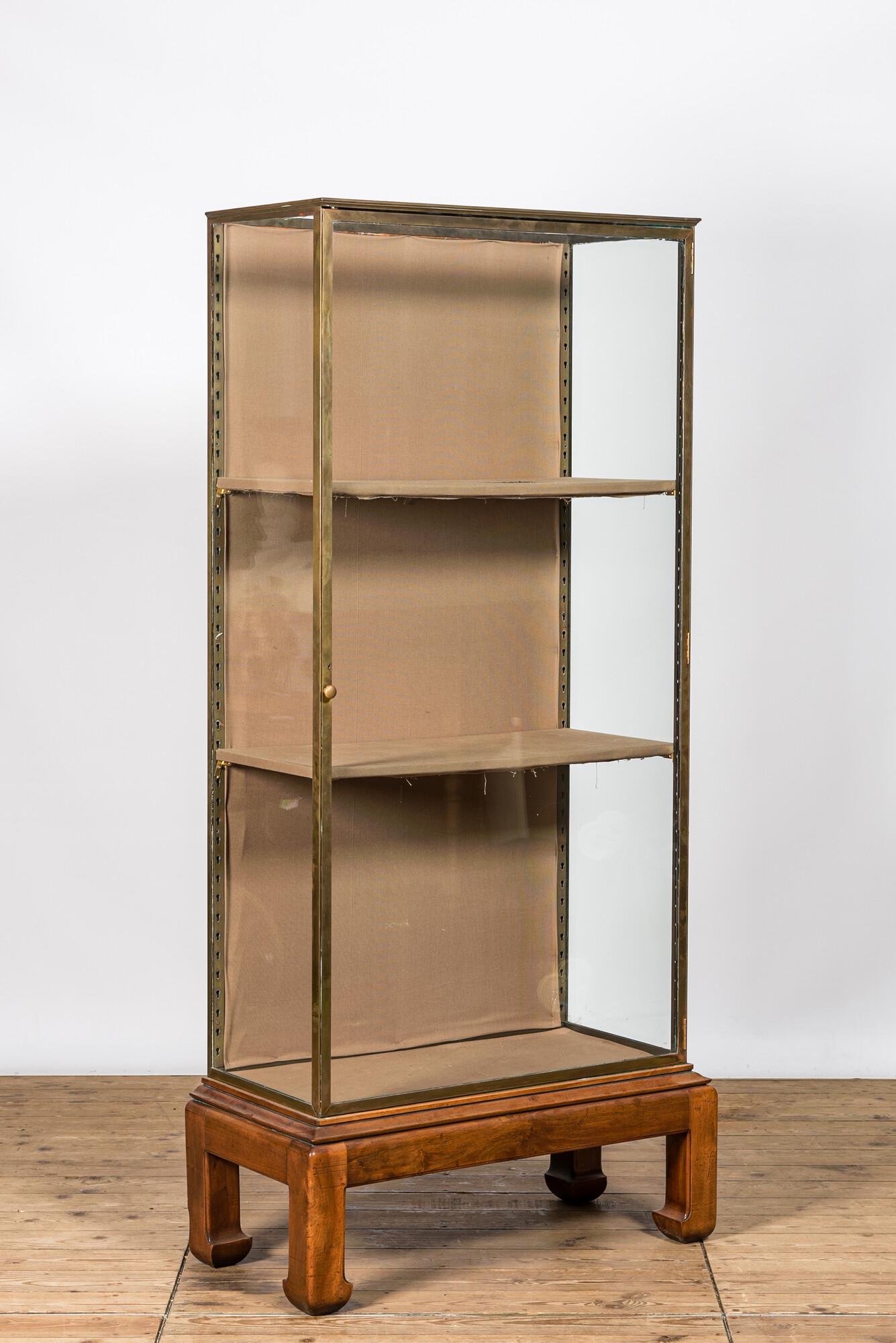 A French brass display cabinet on Asian wooden stand, 20th C. (1 of 3)