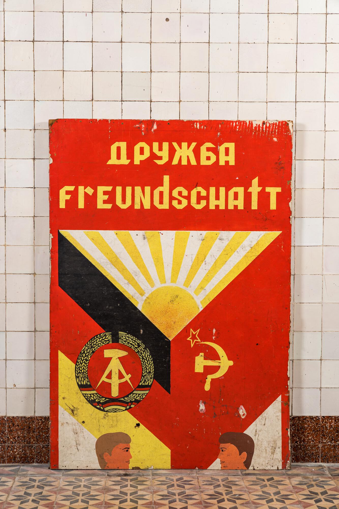 A communist propaganda panel promoting friendship between the DDR and the USSR, 3rd quarter 20th C.: Full title: A communist propaganda panel promoting friendship between the DDR and the USSR, 3rd quarter 20th C. Description: H 159,5 x L 111 cm About this sale: Paul De Grande is one of the major deal