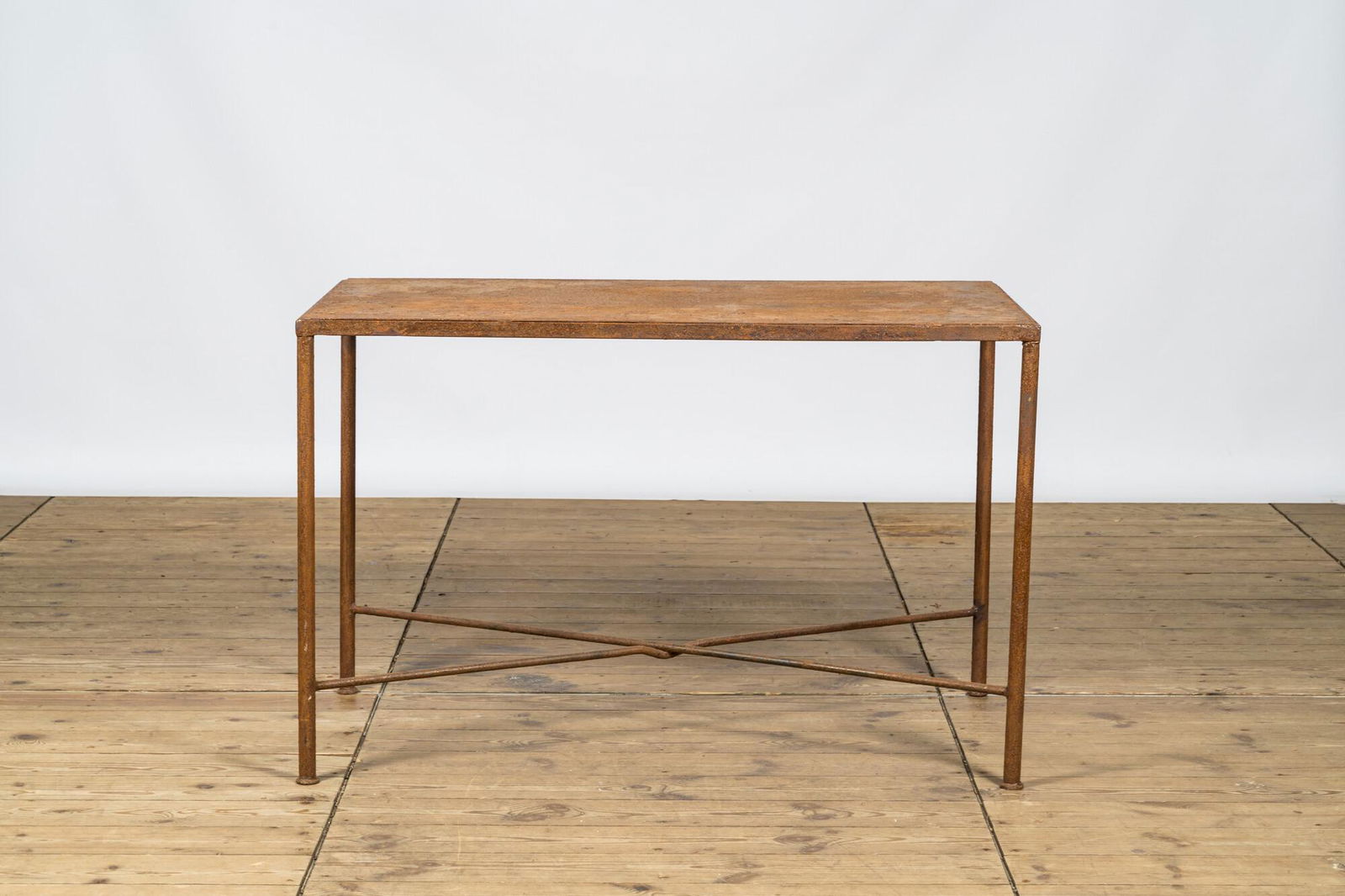 An industrial metal work table, 20th C. (1 of 2)