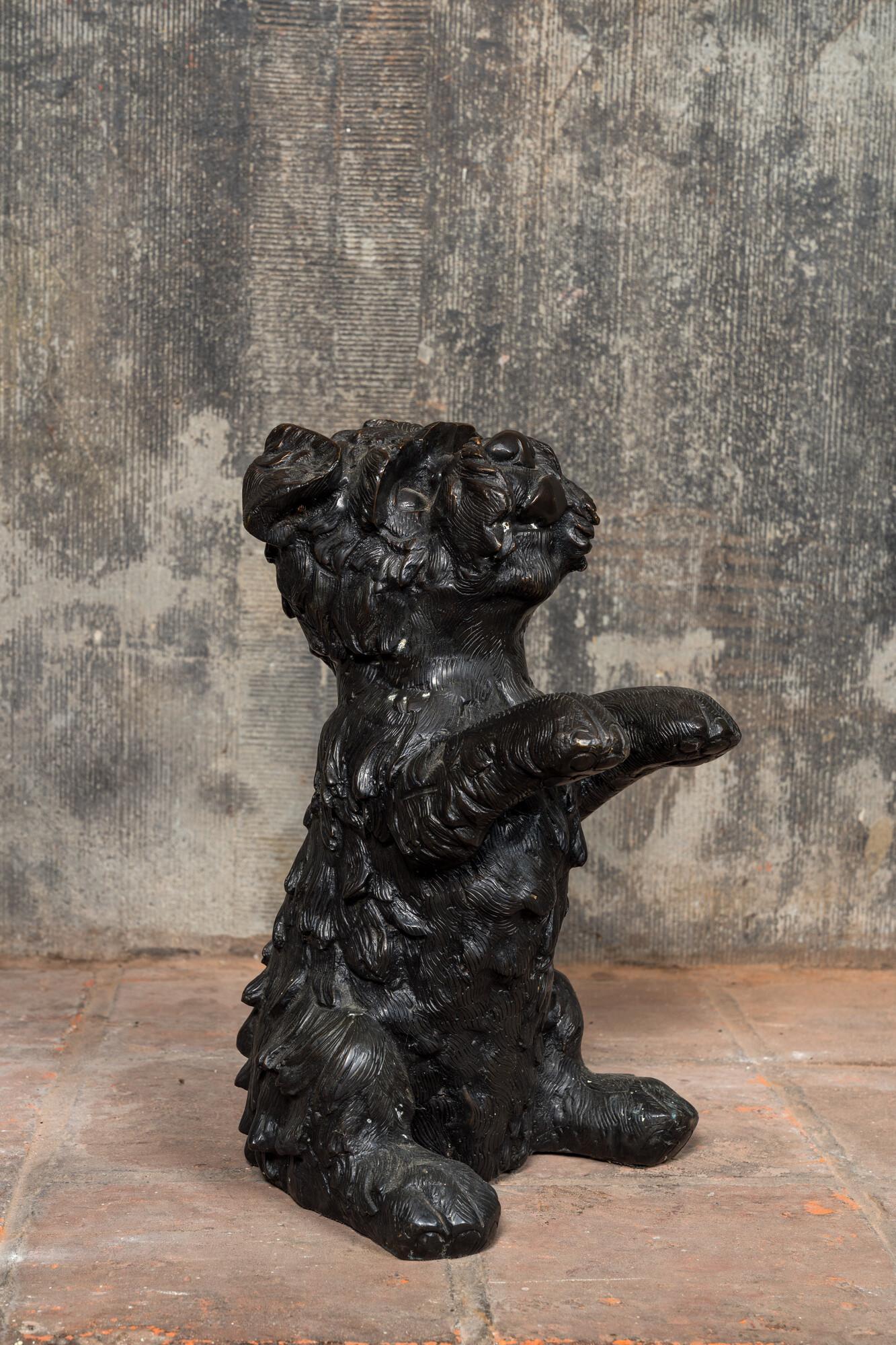 A patinated bronze model of a fox terrier dog, 20th C. (1 of 3)