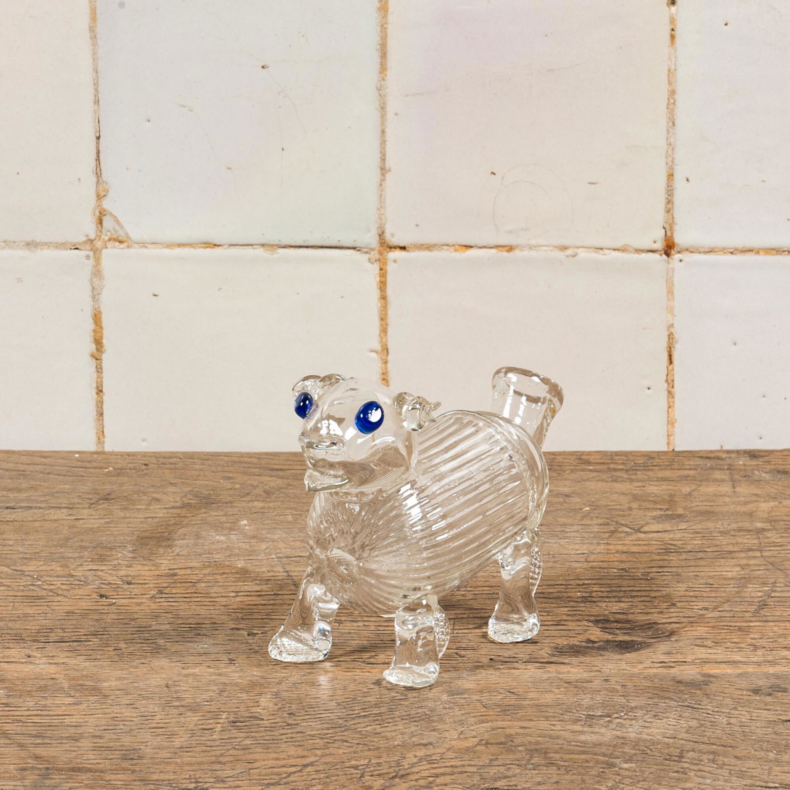 A mouth-blown glass dog, Murano, Italy, 20th C.: Full title: A mouth-blown glass dog, Murano, Italy, 20th C. Description: H 10,5 x L 17 cm About this sale: Paul De Grande is one of the major dealers of antique furniture, fine sculptures and decorati