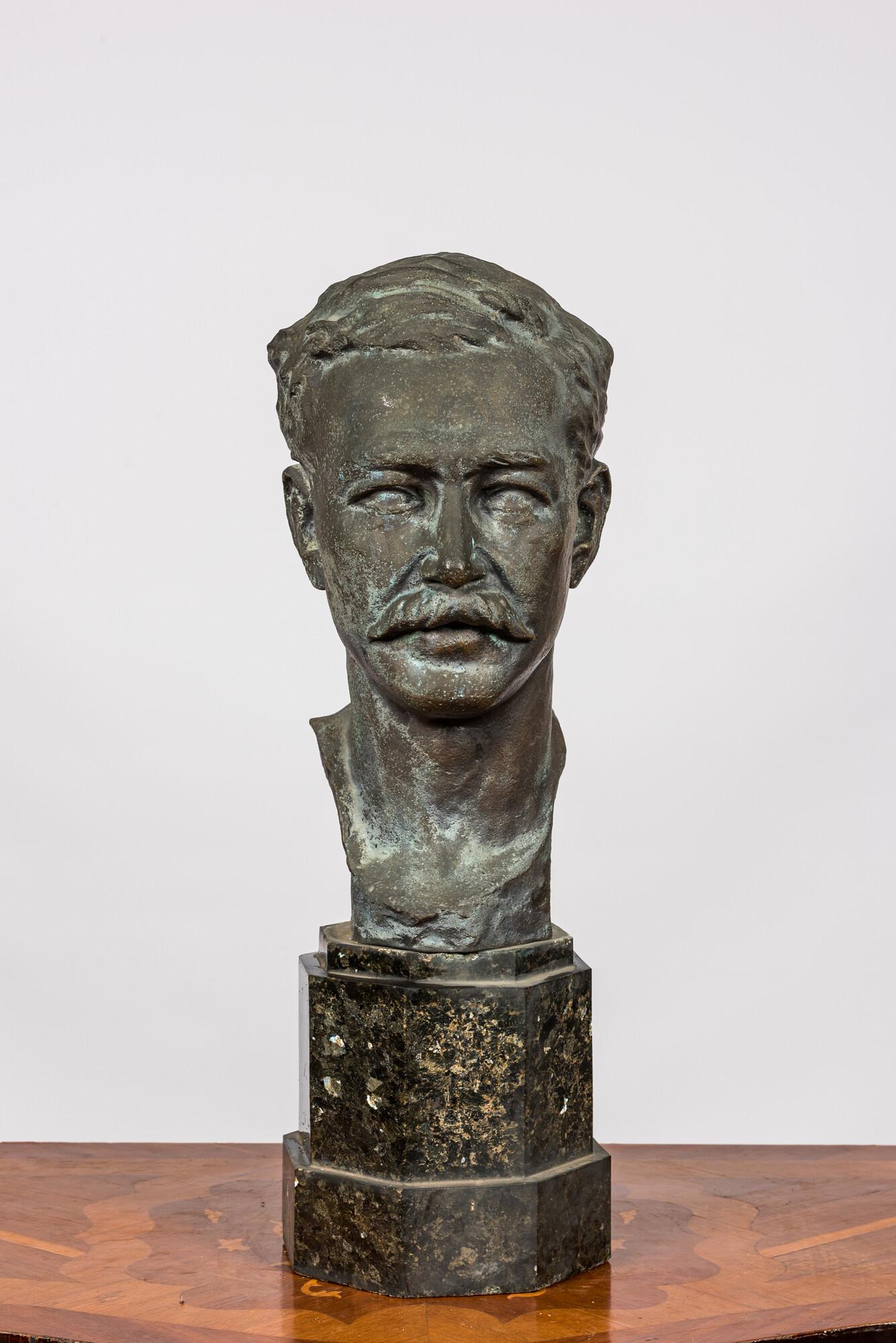 A bronze male bust on a marble base, 20th C. (1 of 3)