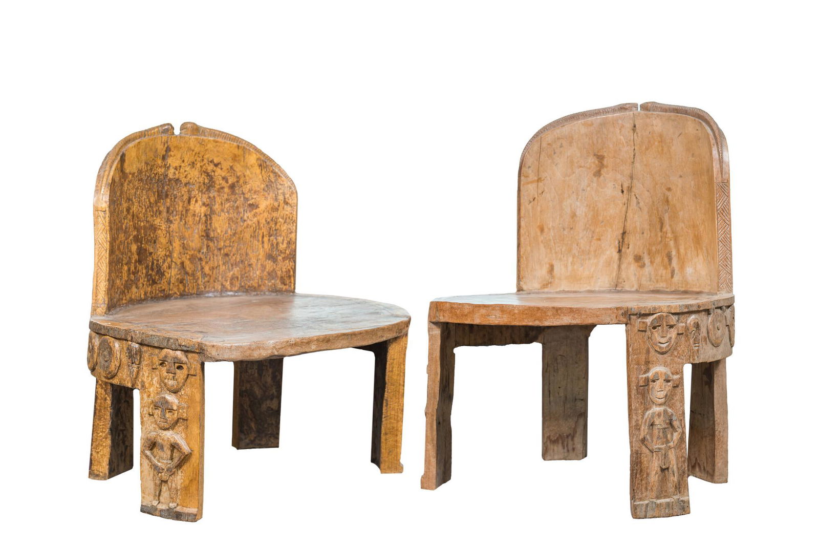 A pair of African carved wooden chairs in Eket-style, 20th C. (1 of 5)