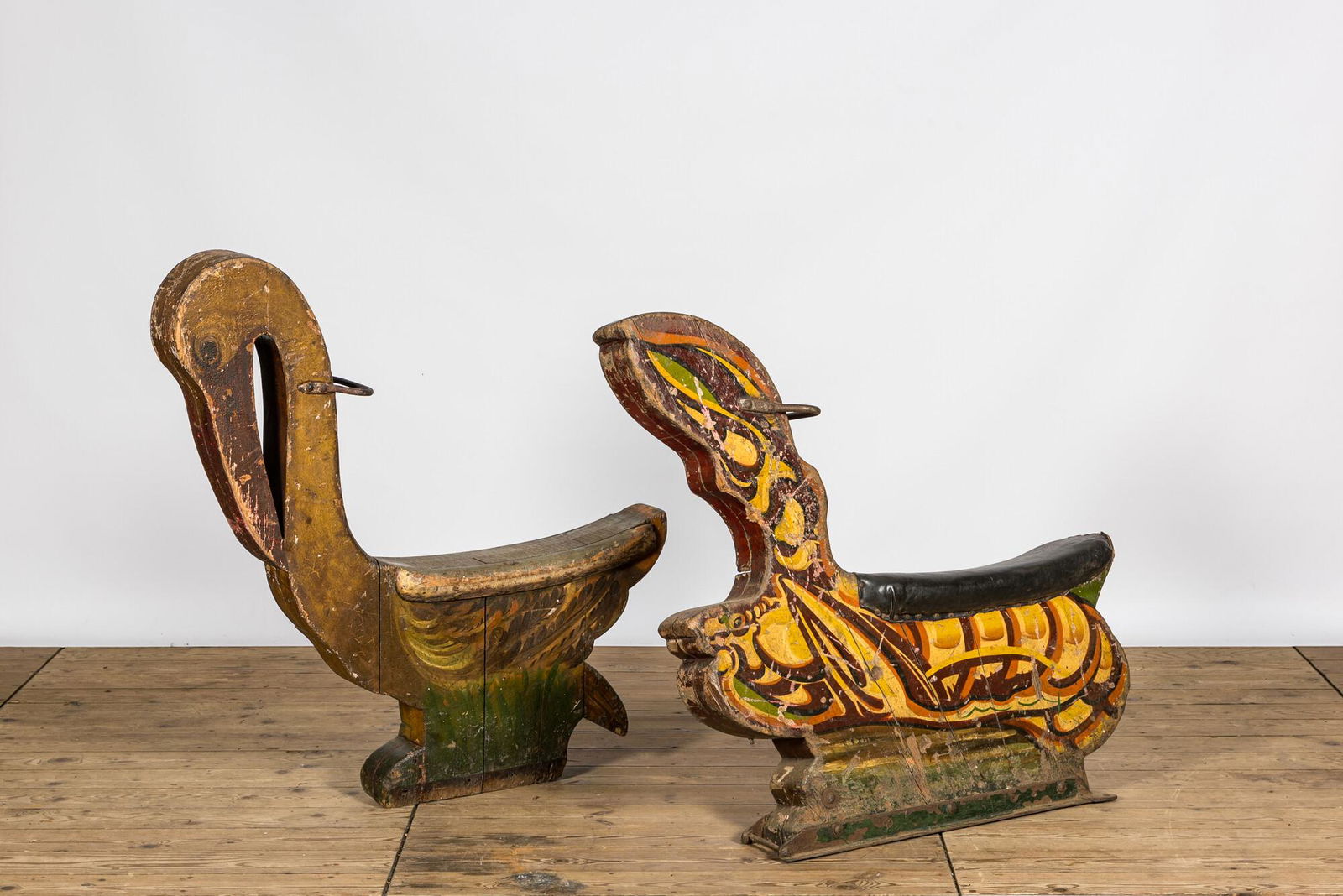 Two polychrome wooden carousel figures in the shape of a pelican and a lobster, 1st half 20th C. (1 of 2)