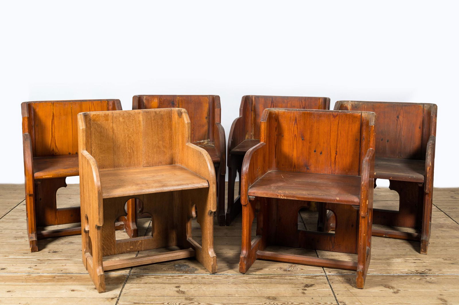 Five Gothic Revival pine chairs and one in oak, 20th C. (1 of 4)