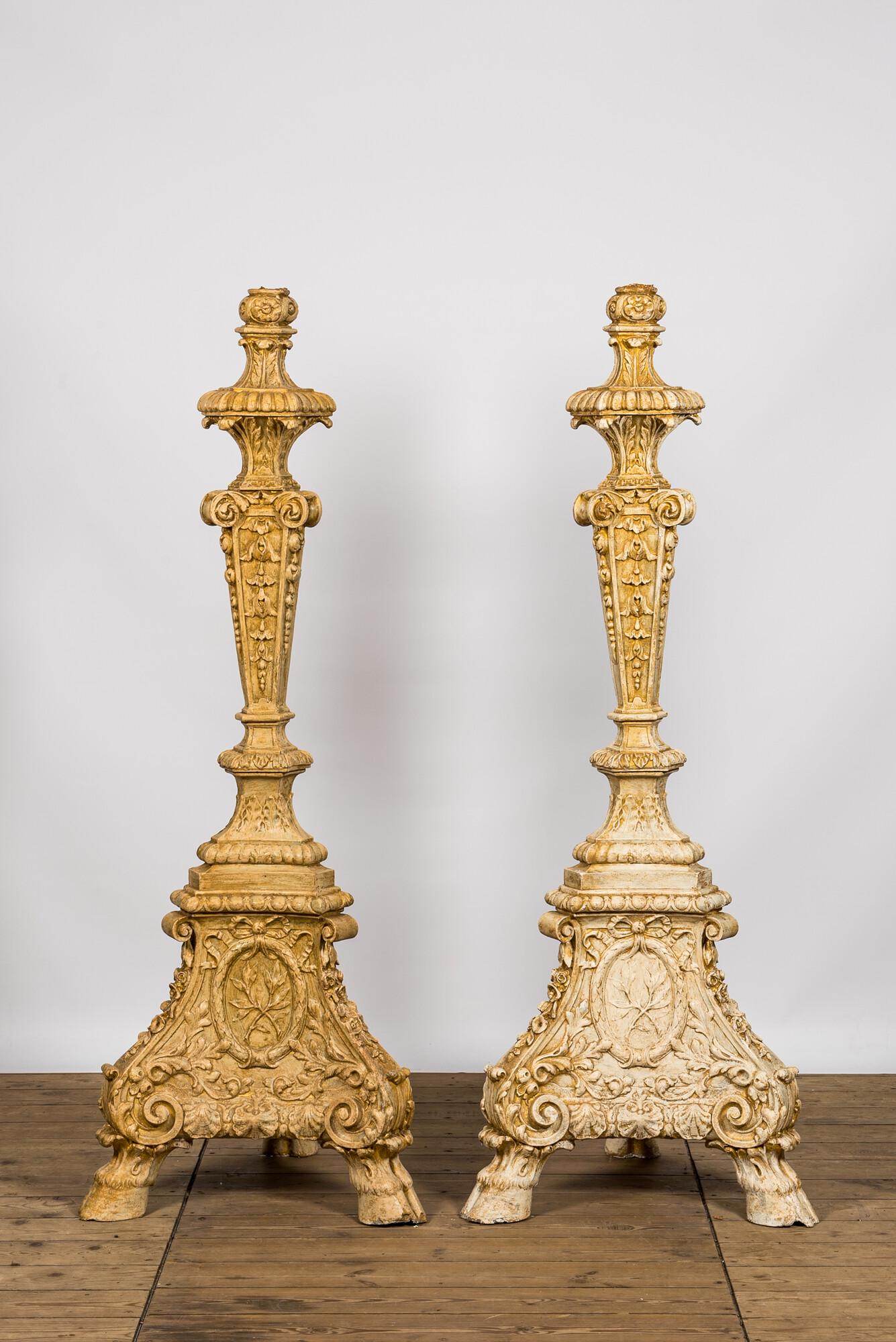 A pair of imposing patinated and gilt church candlesticks, 20th C. (1 of 3)