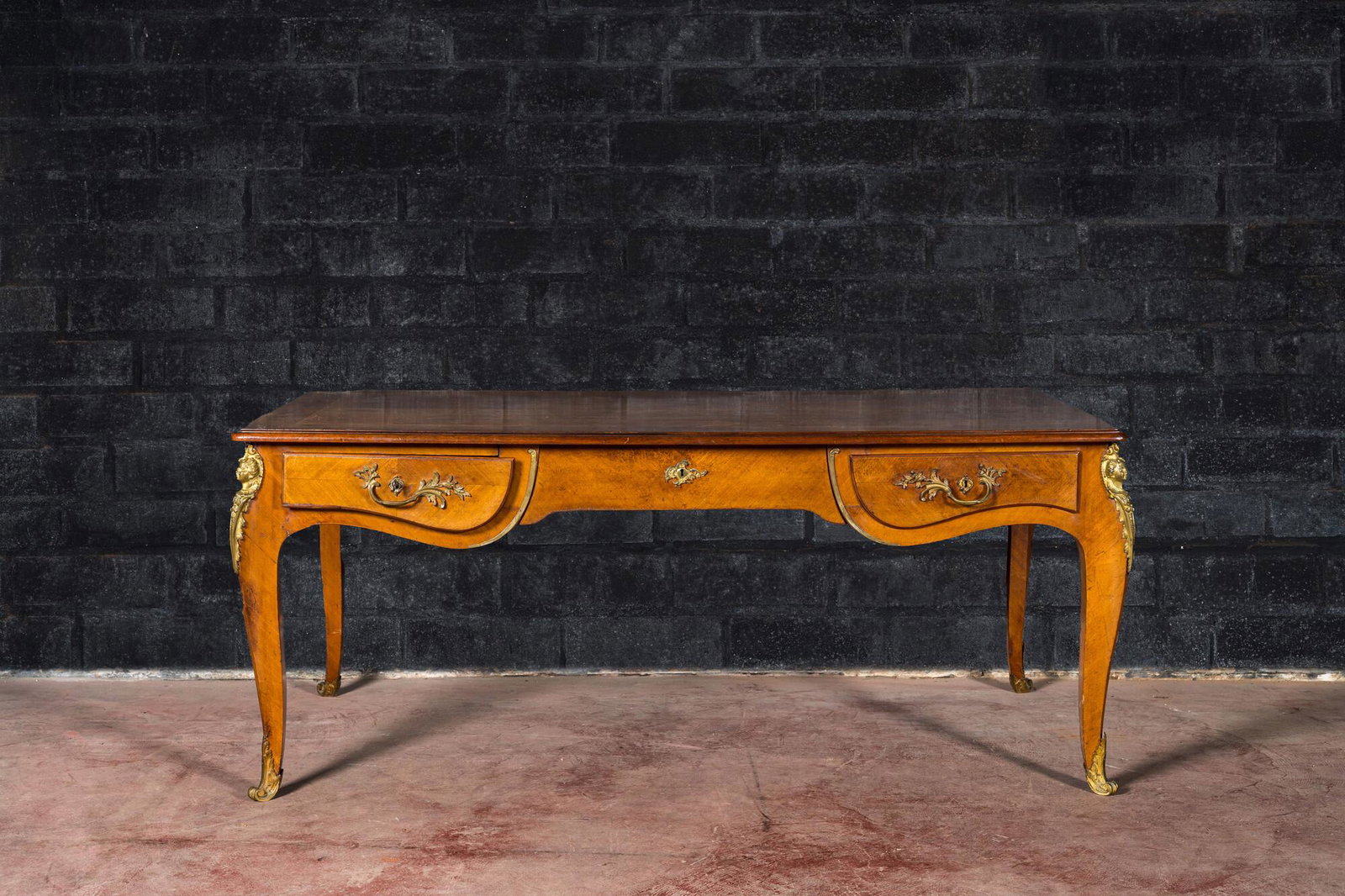 A French Louis XV-style gilt bronze mounted bureau plat, 20th C. (1 of 3)