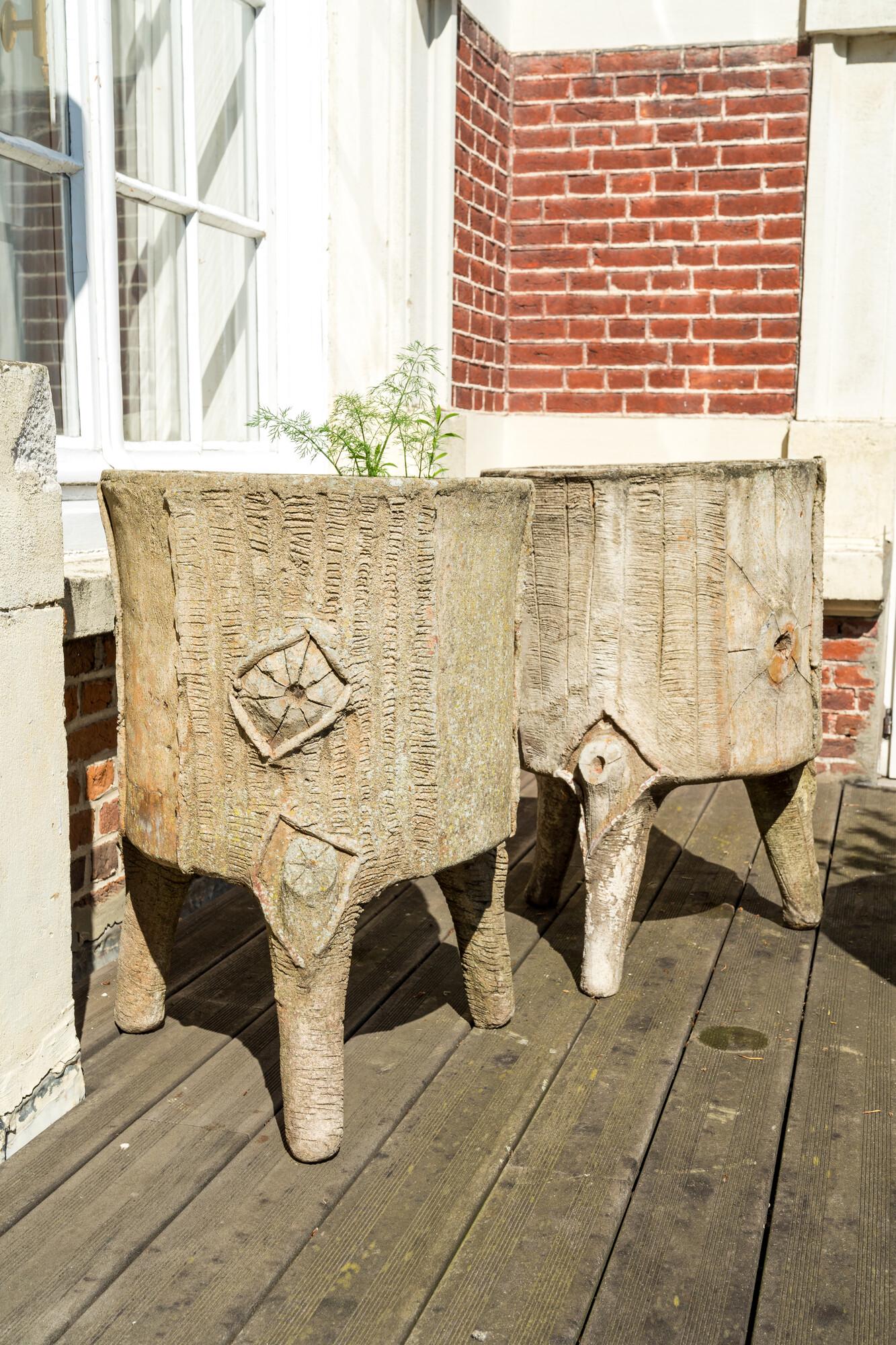A pair of faux-bois tripod planters, 20th C. (1 of 3)