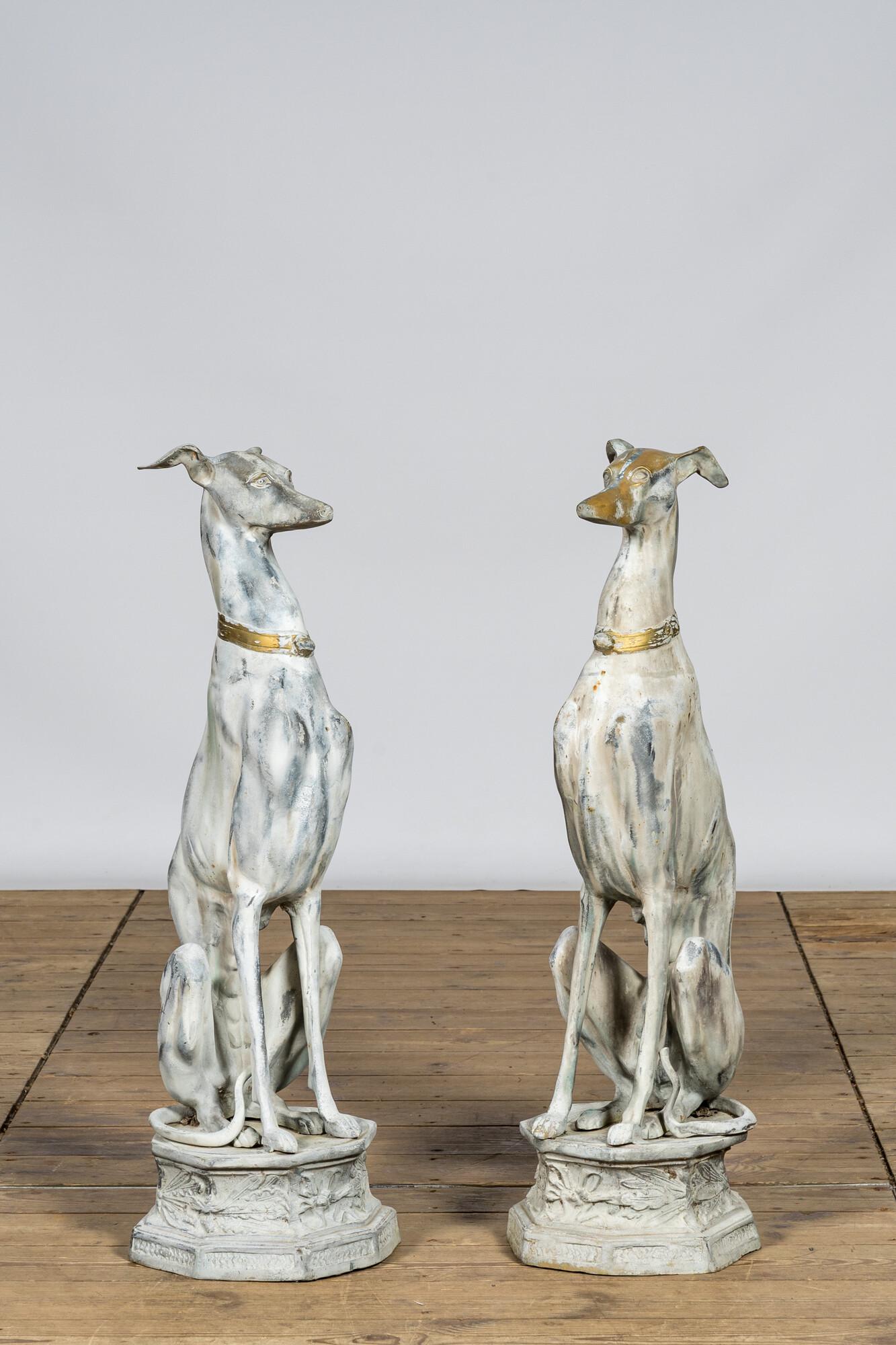 A pair of patinated metal greyhounds, 20th C.: Full title: A pair of patinated metal greyhounds, 20th C. Description: H 82,5 cm About this sale: Paul De Grande is one of the major dealers of antique furniture, fine sculptures and decorative arts i