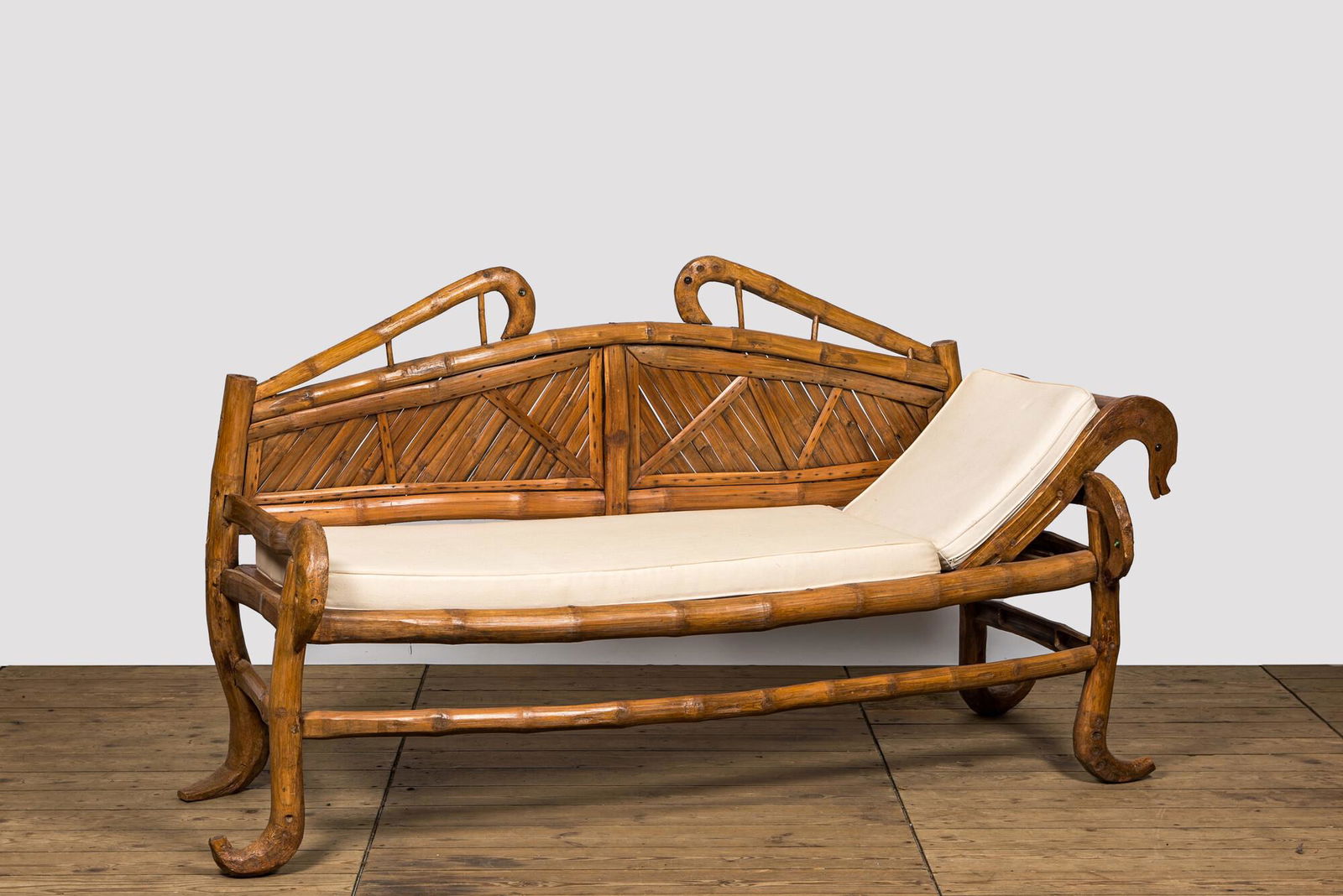 An oriental bamboo sofa-bed, 20th C. (1 of 2)